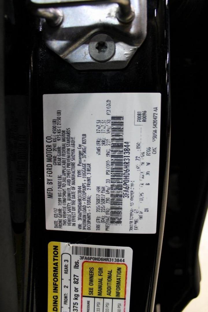 2017 Shadow Black /Ebony Ford Fusion SE (3FA6P0HD6HR) with an 1.5L EcoBoost engine, Automatic transmission, located at 15300 Midway Rd., Addison, TX, 75001, (972) 702-0011, 32.958321, -96.838074 - Stylish, spacious, and built for the road ahead, the 2017 Ford Fusion SE delivers a perfect balance of performance, technology, and comfort. With its sleek design and turbocharged efficiency, this midsize sedan is an outstanding value for anyone looking for a reliable daily driver or a comfortable h - Photo#32