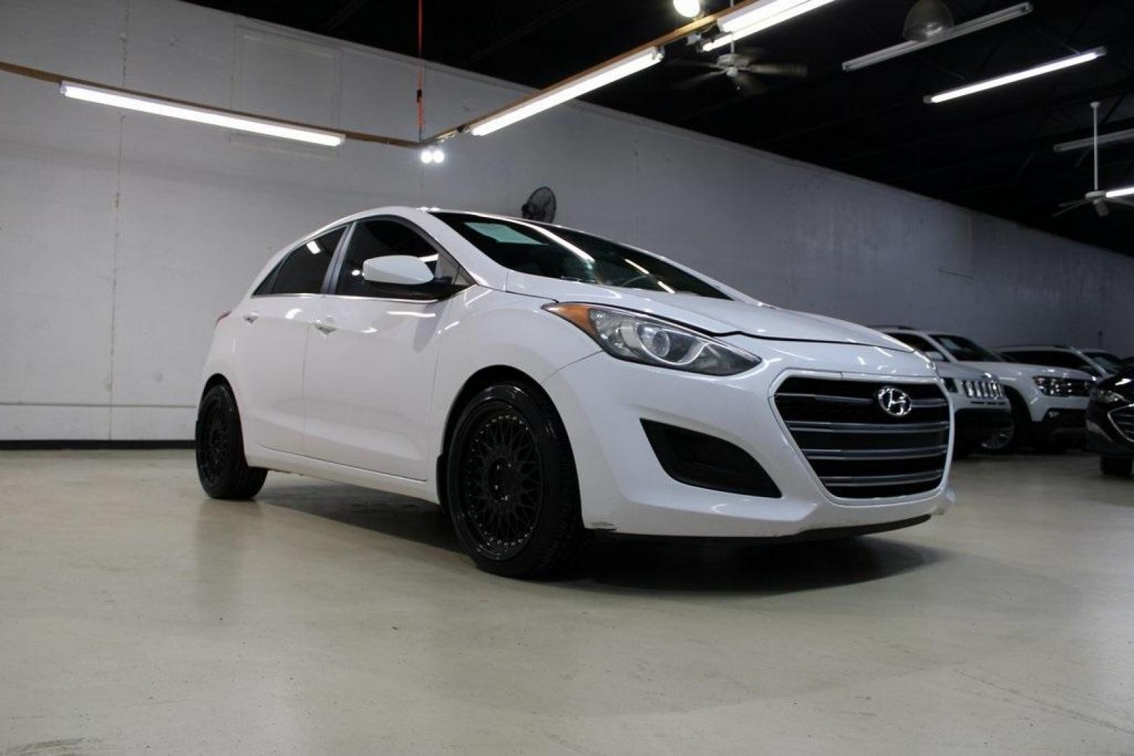 2016 Monaco White /Beige Hyundai Elantra GT Base (KMHD35LH2GU) with an 2.0L DOHC engine, Automatic transmission, located at 15300 Midway Rd., Addison, TX, 75001, (972) 702-0011, 32.958321, -96.838074 - Midway Auto Group in Addison, TX, is excited to offer this 2016 Hyundai Elantra GT, a versatile hatchback that combines spirited performance with practical features, making it an excellent choice for both city driving and weekend adventures.<br><br>Key Features:<br><br>Engine and Performance: Powe - Photo#1