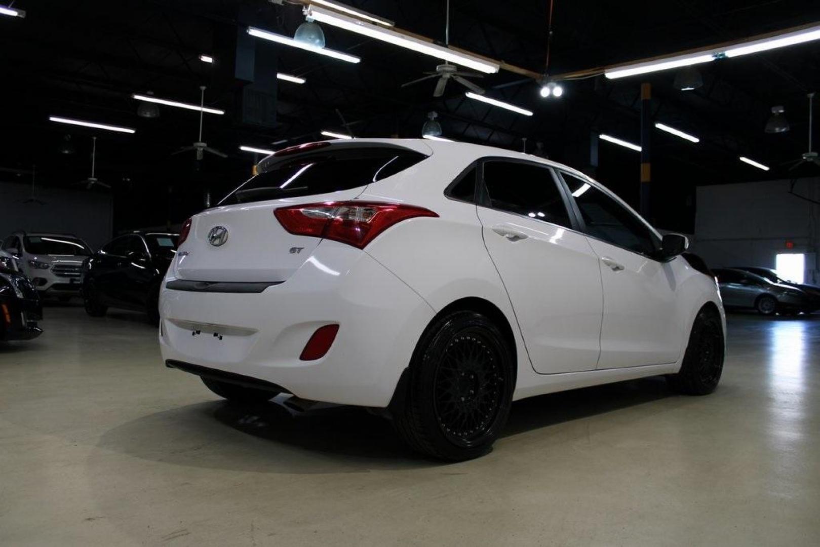 2016 Monaco White /Beige Hyundai Elantra GT Base (KMHD35LH2GU) with an 2.0L DOHC engine, Automatic transmission, located at 15300 Midway Rd., Addison, TX, 75001, (972) 702-0011, 32.958321, -96.838074 - Midway Auto Group in Addison, TX, is excited to offer this 2016 Hyundai Elantra GT, a versatile hatchback that combines spirited performance with practical features, making it an excellent choice for both city driving and weekend adventures.<br><br>Key Features:<br><br>Engine and Performance: Powe - Photo#2