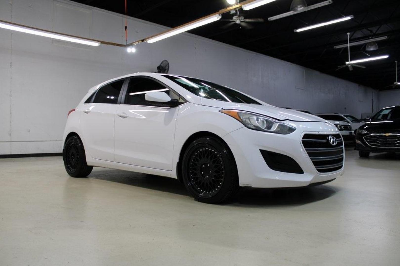 2016 Monaco White /Beige Hyundai Elantra GT Base (KMHD35LH2GU) with an 2.0L DOHC engine, Automatic transmission, located at 15300 Midway Rd., Addison, TX, 75001, (972) 702-0011, 32.958321, -96.838074 - Midway Auto Group in Addison, TX, is excited to offer this 2016 Hyundai Elantra GT, a versatile hatchback that combines spirited performance with practical features, making it an excellent choice for both city driving and weekend adventures.<br><br>Key Features:<br><br>Engine and Performance: Powe - Photo#6