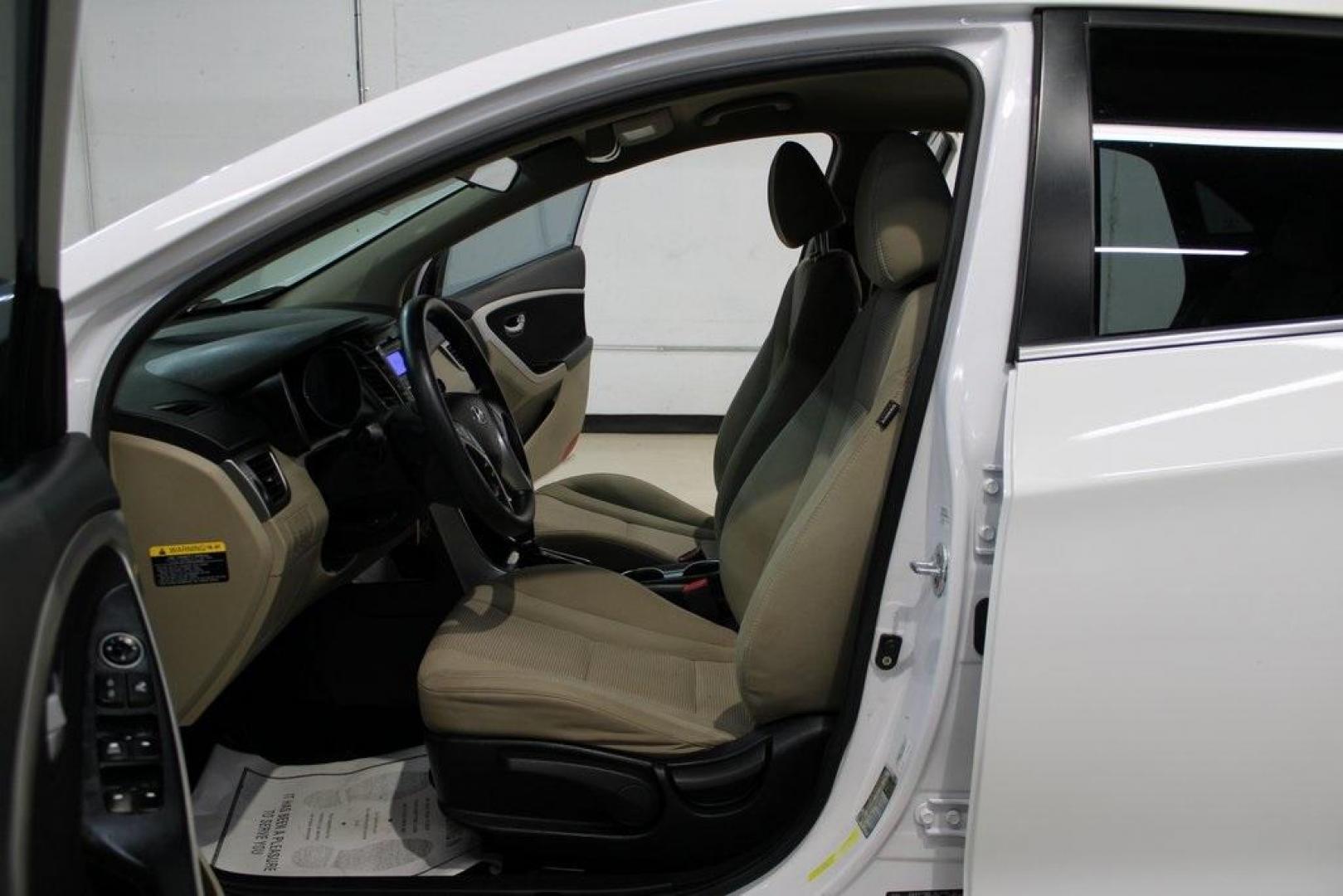 2016 Monaco White /Beige Hyundai Elantra GT Base (KMHD35LH2GU) with an 2.0L DOHC engine, Automatic transmission, located at 15300 Midway Rd., Addison, TX, 75001, (972) 702-0011, 32.958321, -96.838074 - Midway Auto Group in Addison, TX, is excited to offer this 2016 Hyundai Elantra GT, a versatile hatchback that combines spirited performance with practical features, making it an excellent choice for both city driving and weekend adventures.<br><br>Key Features:<br><br>Engine and Performance: Powe - Photo#13