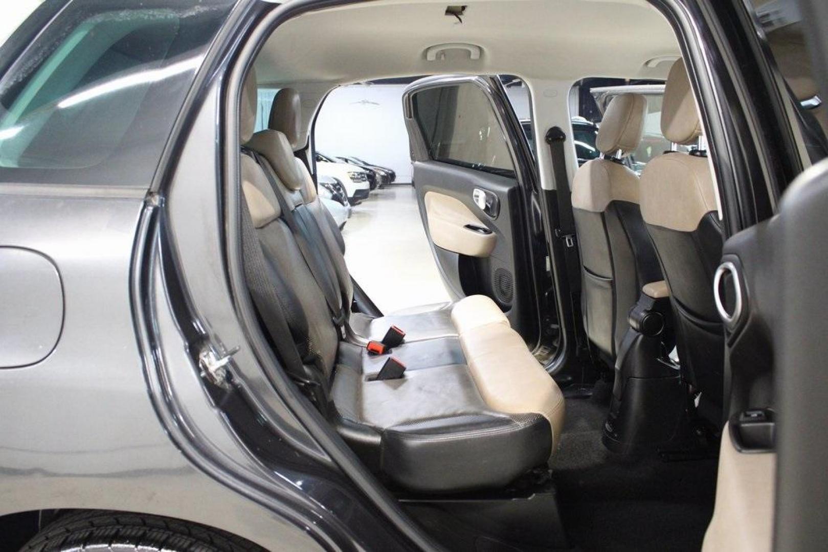 2015 Grigio Scuro (Gray Metallic) /Black Fiat 500L Lounge (ZFBCFACH8FZ) with an 1.4L I4 16V MultiAir Turbocharged engine, Automatic transmission, located at 15300 Midway Rd., Addison, TX, 75001, (972) 702-0011, 32.958321, -96.838074 - Introducing the 2015 Fiat 500L, now available at Midway Auto Group in Addison, Texas. This compact yet spacious vehicle offers a unique blend of Italian design and practicality, making it an excellent choice for those seeking style and versatility.<br>VinInspect<br><br>Key Features:<br><br>Engine: 1 - Photo#11