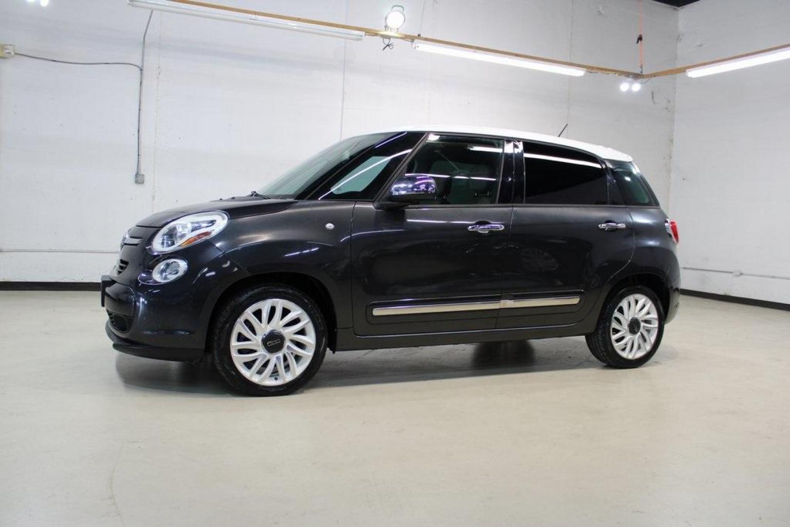 2015 Grigio Scuro (Gray Metallic) /Black Fiat 500L Lounge (ZFBCFACH8FZ) with an 1.4L I4 16V MultiAir Turbocharged engine, Automatic transmission, located at 15300 Midway Rd., Addison, TX, 75001, (972) 702-0011, 32.958321, -96.838074 - Introducing the 2015 Fiat 500L, now available at Midway Auto Group in Addison, Texas. This compact yet spacious vehicle offers a unique blend of Italian design and practicality, making it an excellent choice for those seeking style and versatility.<br>VinInspect<br><br>Key Features:<br><br>Engine: 1 - Photo#3