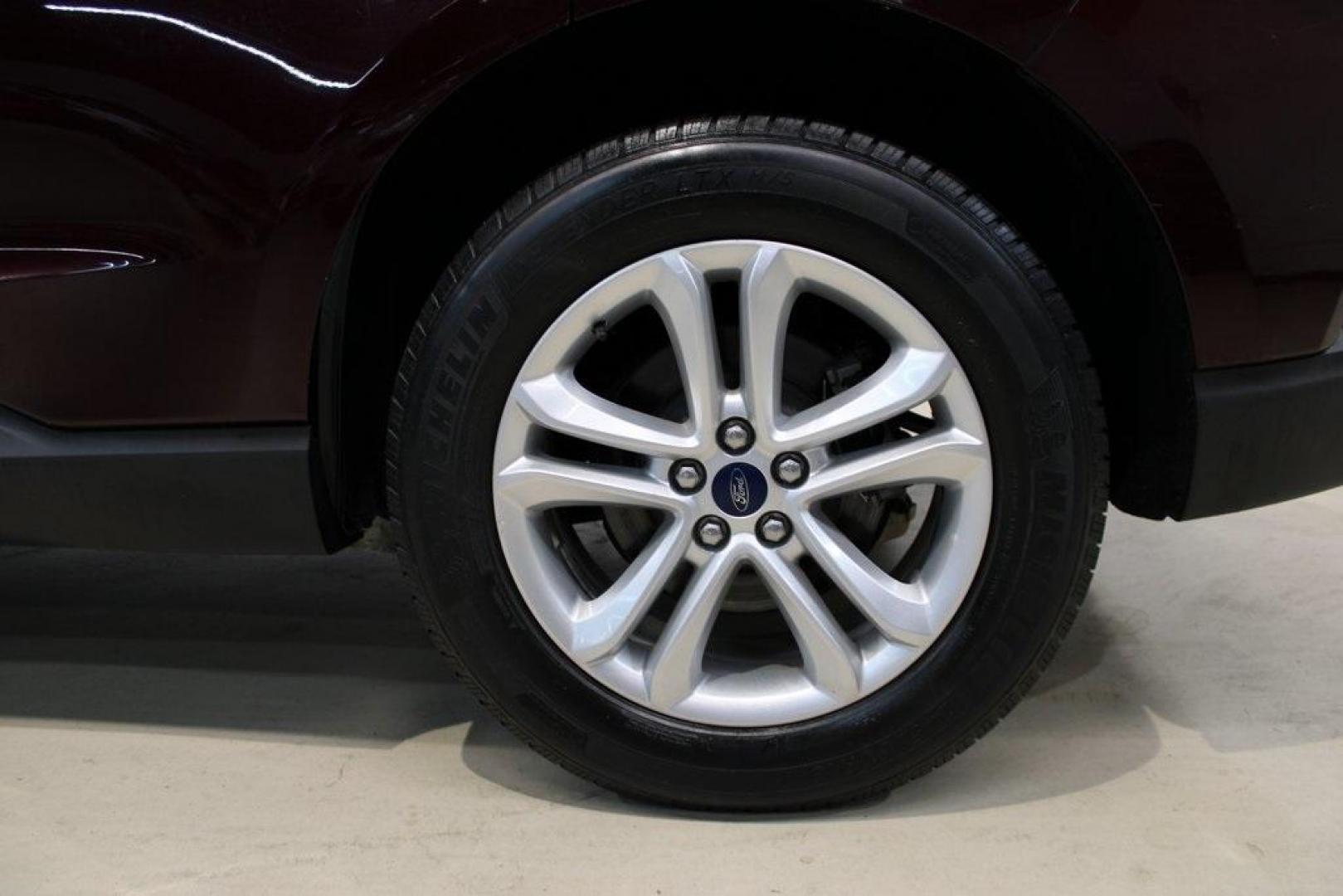 2020 Burgundy /Ebony Ford Edge SEL (2FMPK4J93LB) with an EcoBoost 2.0L I4 GTDi DOHC Turbocharged VCT engine, Automatic transmission, located at 15300 Midway Rd., Addison, TX, 75001, (972) 702-0011, 32.958321, -96.838074 - HOME OF THE NO HAGGLE PRICE - WHOLESALE PRICES TO THE PUBLIC!! Priced below KBB Fair Purchase Price!<br><br>Burgundy 2020 Ford Edge SEL<br><br>Recent Arrival! 21/28 City/Highway MPG<br><br><br>At Midway Auto Group, we strive to provide you with the best quality vehicles for the lowest possible price - Photo#10