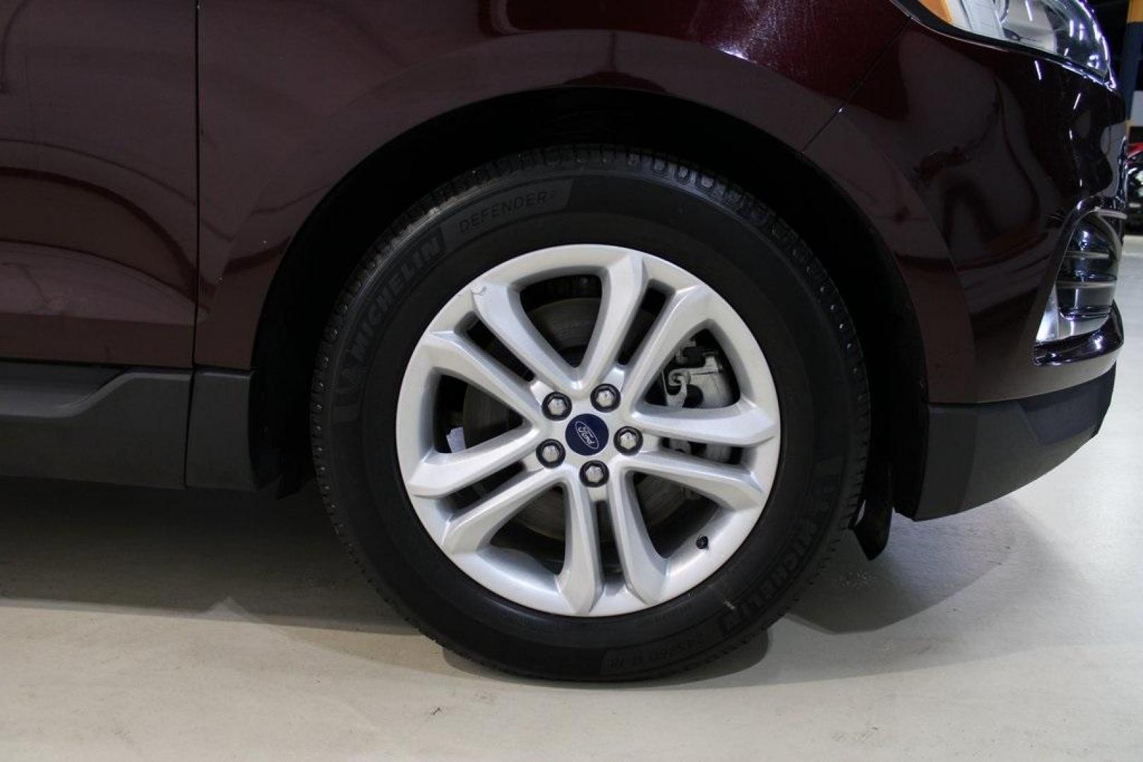 2020 Burgundy /Ebony Ford Edge SEL (2FMPK4J93LB) with an EcoBoost 2.0L I4 GTDi DOHC Turbocharged VCT engine, Automatic transmission, located at 15300 Midway Rd., Addison, TX, 75001, (972) 702-0011, 32.958321, -96.838074 - HOME OF THE NO HAGGLE PRICE - WHOLESALE PRICES TO THE PUBLIC!! Priced below KBB Fair Purchase Price!<br><br>Burgundy 2020 Ford Edge SEL<br><br>Recent Arrival! 21/28 City/Highway MPG<br><br><br>At Midway Auto Group, we strive to provide you with the best quality vehicles for the lowest possible price - Photo#12