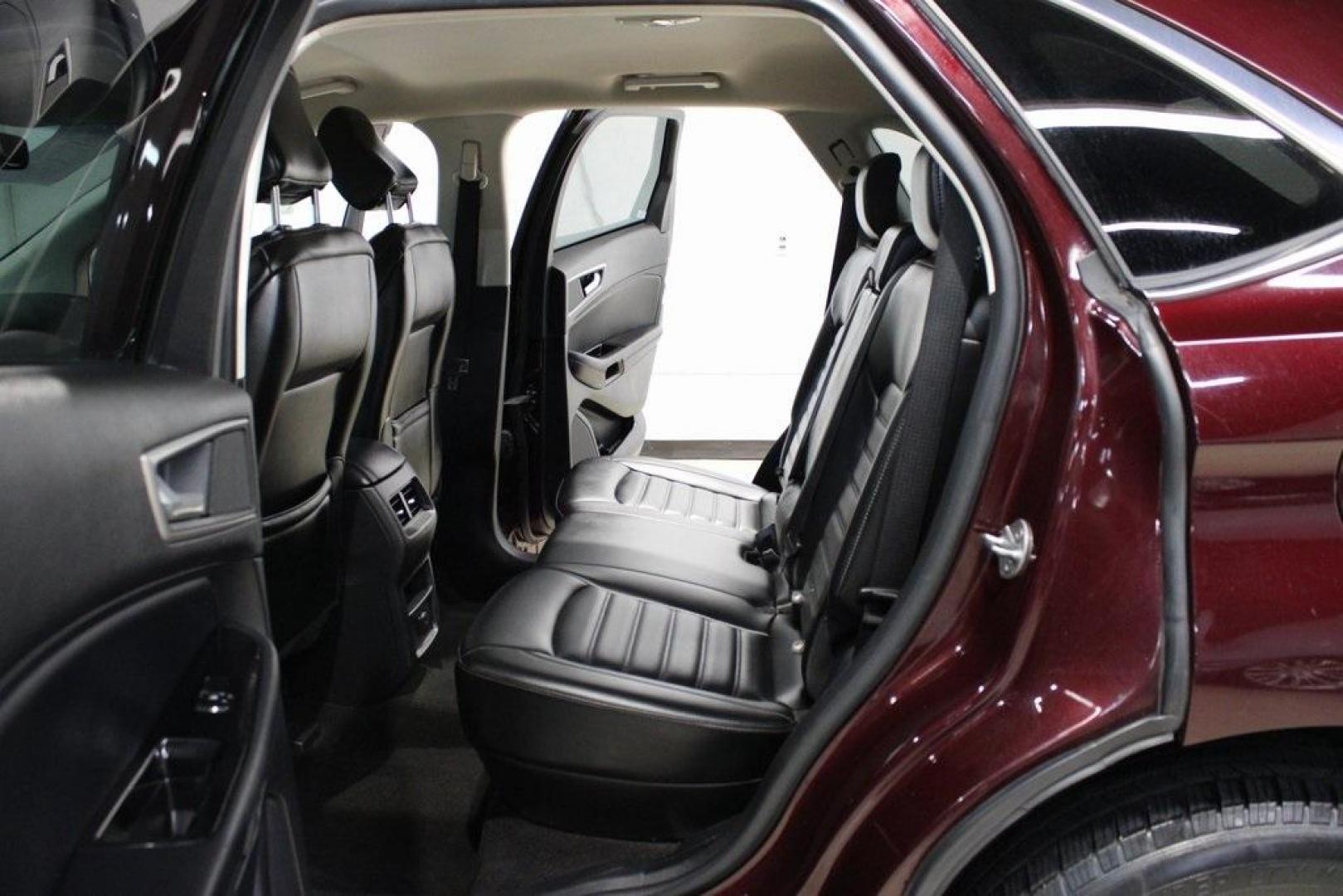 2020 Burgundy /Ebony Ford Edge SEL (2FMPK4J93LB) with an EcoBoost 2.0L I4 GTDi DOHC Turbocharged VCT engine, Automatic transmission, located at 15300 Midway Rd., Addison, TX, 75001, (972) 702-0011, 32.958321, -96.838074 - HOME OF THE NO HAGGLE PRICE - WHOLESALE PRICES TO THE PUBLIC!! Priced below KBB Fair Purchase Price!<br><br>Burgundy 2020 Ford Edge SEL<br><br>Recent Arrival! 21/28 City/Highway MPG<br><br><br>At Midway Auto Group, we strive to provide you with the best quality vehicles for the lowest possible price - Photo#17