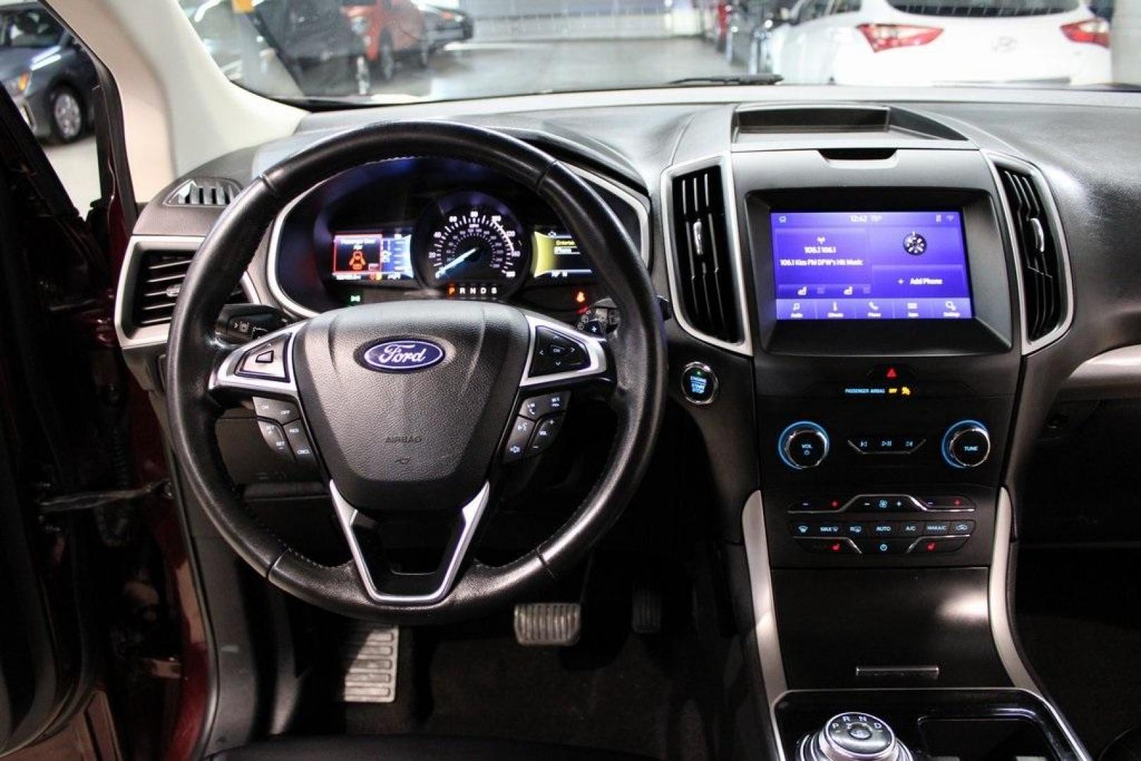2020 Burgundy /Ebony Ford Edge SEL (2FMPK4J93LB) with an EcoBoost 2.0L I4 GTDi DOHC Turbocharged VCT engine, Automatic transmission, located at 15300 Midway Rd., Addison, TX, 75001, (972) 702-0011, 32.958321, -96.838074 - HOME OF THE NO HAGGLE PRICE - WHOLESALE PRICES TO THE PUBLIC!! Priced below KBB Fair Purchase Price!<br><br>Burgundy 2020 Ford Edge SEL<br><br>Recent Arrival! 21/28 City/Highway MPG<br><br><br>At Midway Auto Group, we strive to provide you with the best quality vehicles for the lowest possible price - Photo#18