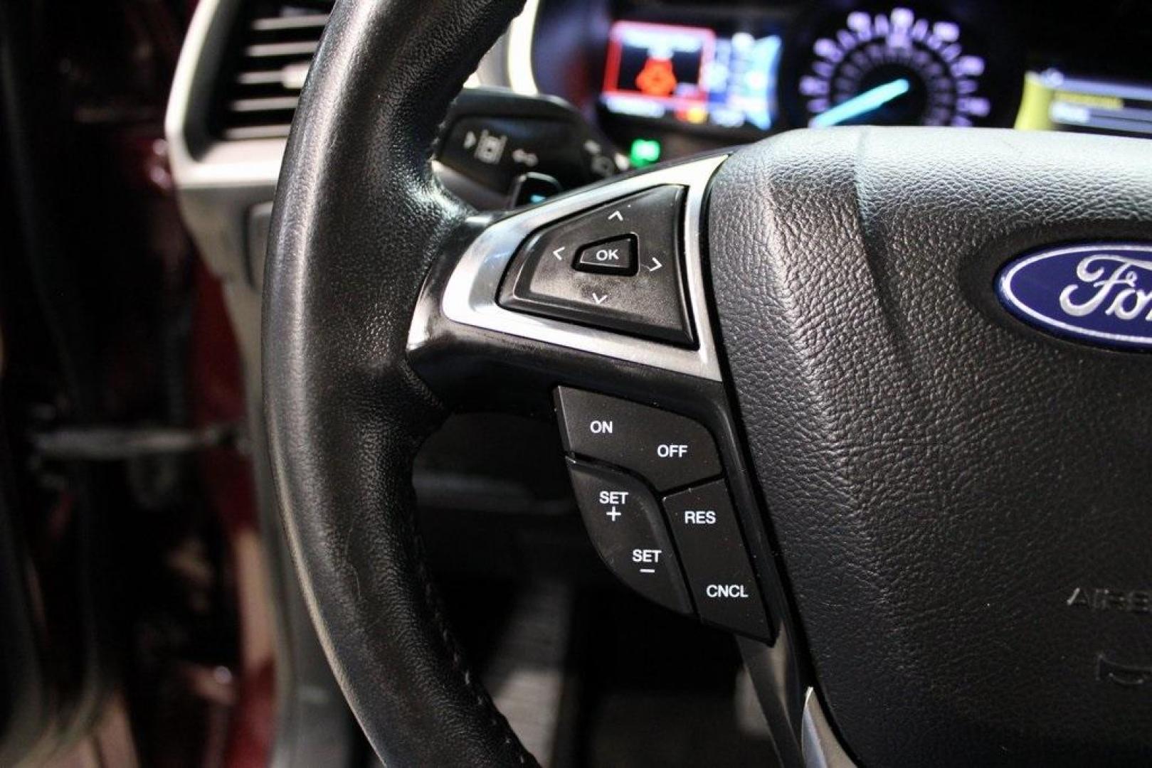 2020 Burgundy /Ebony Ford Edge SEL (2FMPK4J93LB) with an EcoBoost 2.0L I4 GTDi DOHC Turbocharged VCT engine, Automatic transmission, located at 15300 Midway Rd., Addison, TX, 75001, (972) 702-0011, 32.958321, -96.838074 - HOME OF THE NO HAGGLE PRICE - WHOLESALE PRICES TO THE PUBLIC!! Priced below KBB Fair Purchase Price!<br><br>Burgundy 2020 Ford Edge SEL<br><br>Recent Arrival! 21/28 City/Highway MPG<br><br><br>At Midway Auto Group, we strive to provide you with the best quality vehicles for the lowest possible price - Photo#25