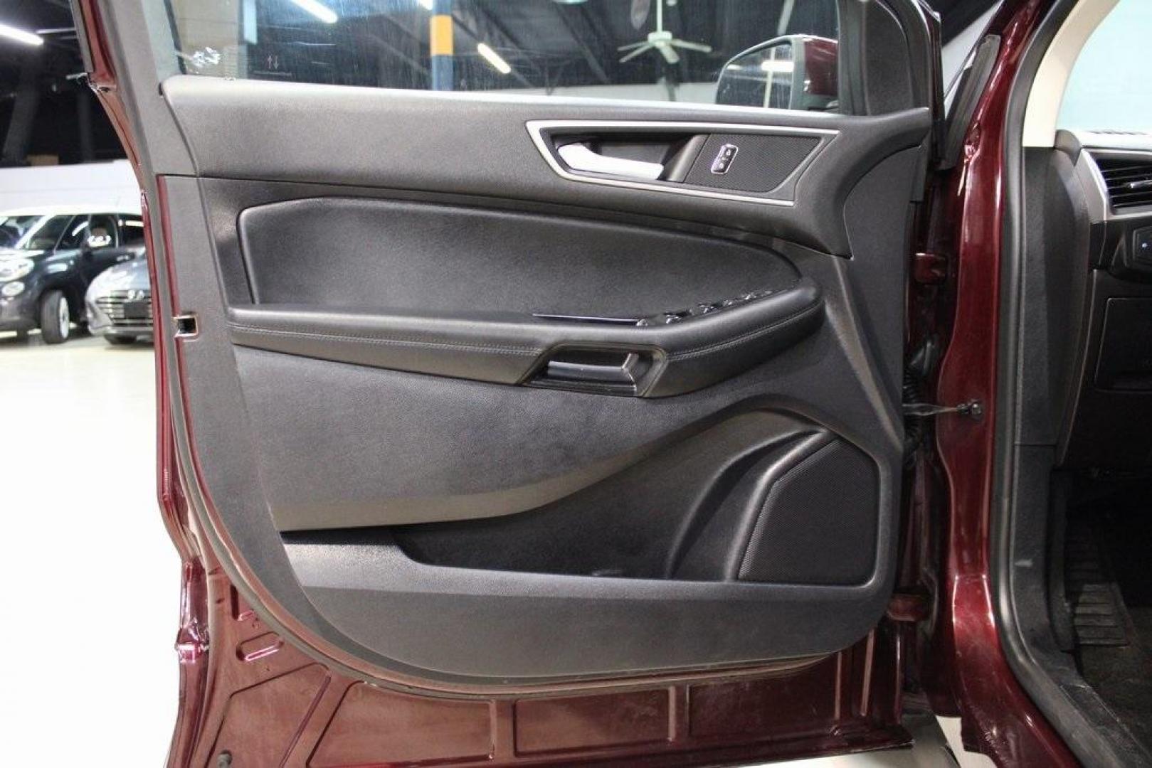 2020 Burgundy /Ebony Ford Edge SEL (2FMPK4J93LB) with an EcoBoost 2.0L I4 GTDi DOHC Turbocharged VCT engine, Automatic transmission, located at 15300 Midway Rd., Addison, TX, 75001, (972) 702-0011, 32.958321, -96.838074 - HOME OF THE NO HAGGLE PRICE - WHOLESALE PRICES TO THE PUBLIC!! Priced below KBB Fair Purchase Price!<br><br>Burgundy 2020 Ford Edge SEL<br><br>Recent Arrival! 21/28 City/Highway MPG<br><br><br>At Midway Auto Group, we strive to provide you with the best quality vehicles for the lowest possible price - Photo#26