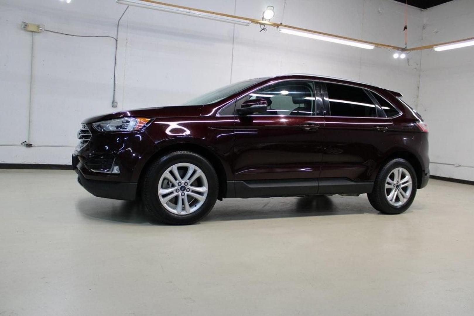 2020 Burgundy /Ebony Ford Edge SEL (2FMPK4J93LB) with an EcoBoost 2.0L I4 GTDi DOHC Turbocharged VCT engine, Automatic transmission, located at 15300 Midway Rd., Addison, TX, 75001, (972) 702-0011, 32.958321, -96.838074 - HOME OF THE NO HAGGLE PRICE - WHOLESALE PRICES TO THE PUBLIC!! Priced below KBB Fair Purchase Price!<br><br>Burgundy 2020 Ford Edge SEL<br><br>Recent Arrival! 21/28 City/Highway MPG<br><br><br>At Midway Auto Group, we strive to provide you with the best quality vehicles for the lowest possible price - Photo#4