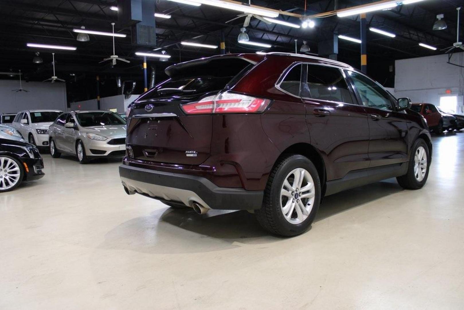 2020 Burgundy /Ebony Ford Edge SEL (2FMPK4J93LB) with an EcoBoost 2.0L I4 GTDi DOHC Turbocharged VCT engine, Automatic transmission, located at 15300 Midway Rd., Addison, TX, 75001, (972) 702-0011, 32.958321, -96.838074 - HOME OF THE NO HAGGLE PRICE - WHOLESALE PRICES TO THE PUBLIC!! Priced below KBB Fair Purchase Price!<br><br>Burgundy 2020 Ford Edge SEL<br><br>Recent Arrival! 21/28 City/Highway MPG<br><br><br>At Midway Auto Group, we strive to provide you with the best quality vehicles for the lowest possible price - Photo#7