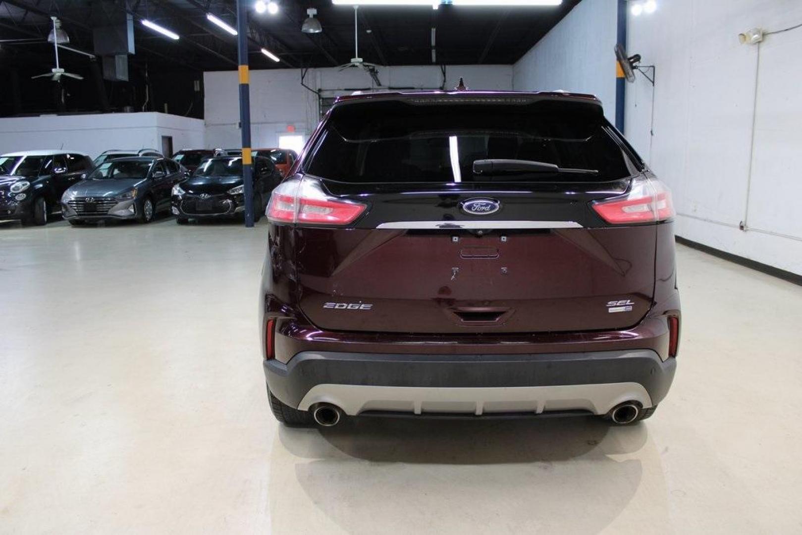 2020 Burgundy /Ebony Ford Edge SEL (2FMPK4J93LB) with an EcoBoost 2.0L I4 GTDi DOHC Turbocharged VCT engine, Automatic transmission, located at 15300 Midway Rd., Addison, TX, 75001, (972) 702-0011, 32.958321, -96.838074 - HOME OF THE NO HAGGLE PRICE - WHOLESALE PRICES TO THE PUBLIC!! Priced below KBB Fair Purchase Price!<br><br>Burgundy 2020 Ford Edge SEL<br><br>Recent Arrival! 21/28 City/Highway MPG<br><br><br>At Midway Auto Group, we strive to provide you with the best quality vehicles for the lowest possible price - Photo#8