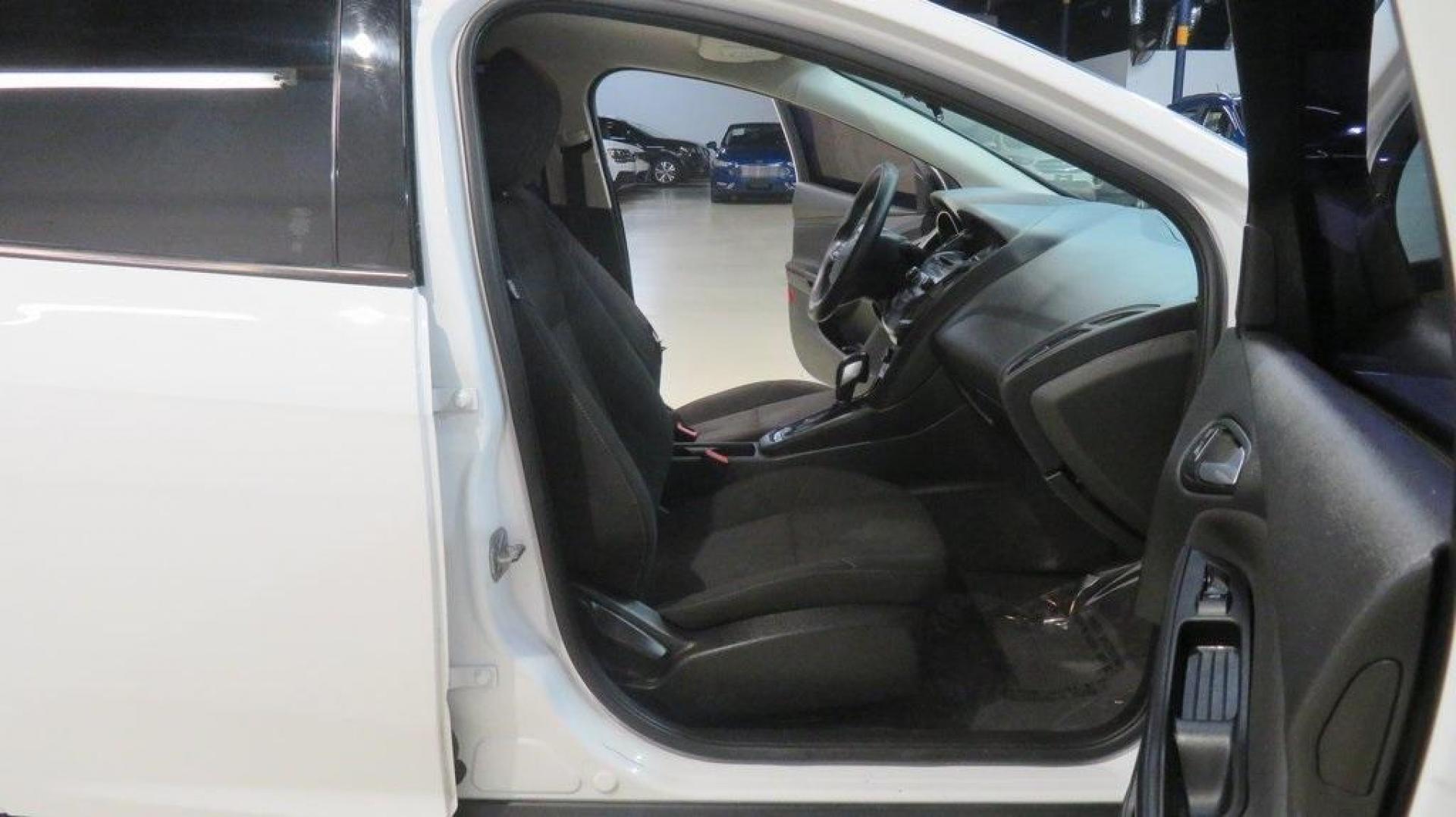 2017 Oxford White /Charcoal Black Ford Focus SE (1FADP3K2XHL) with an 2.0L 4-Cylinder DGI Flex Fuel DOHC engine, Automatic transmission, located at 15300 Midway Rd., Addison, TX, 75001, (972) 702-0011, 32.958321, -96.838074 - Introducing the 2017 Ford Focus SE Hatchback, now available at Midway Auto Group in Addison, Texas. This versatile and stylish compact car is designed to meet the needs of both city driving and weekend adventures.<br><br>Key Features:<br><br>Engine: 2.0L Ti-VCT I-4<br><br>Transmission: 6-speed autom - Photo#13