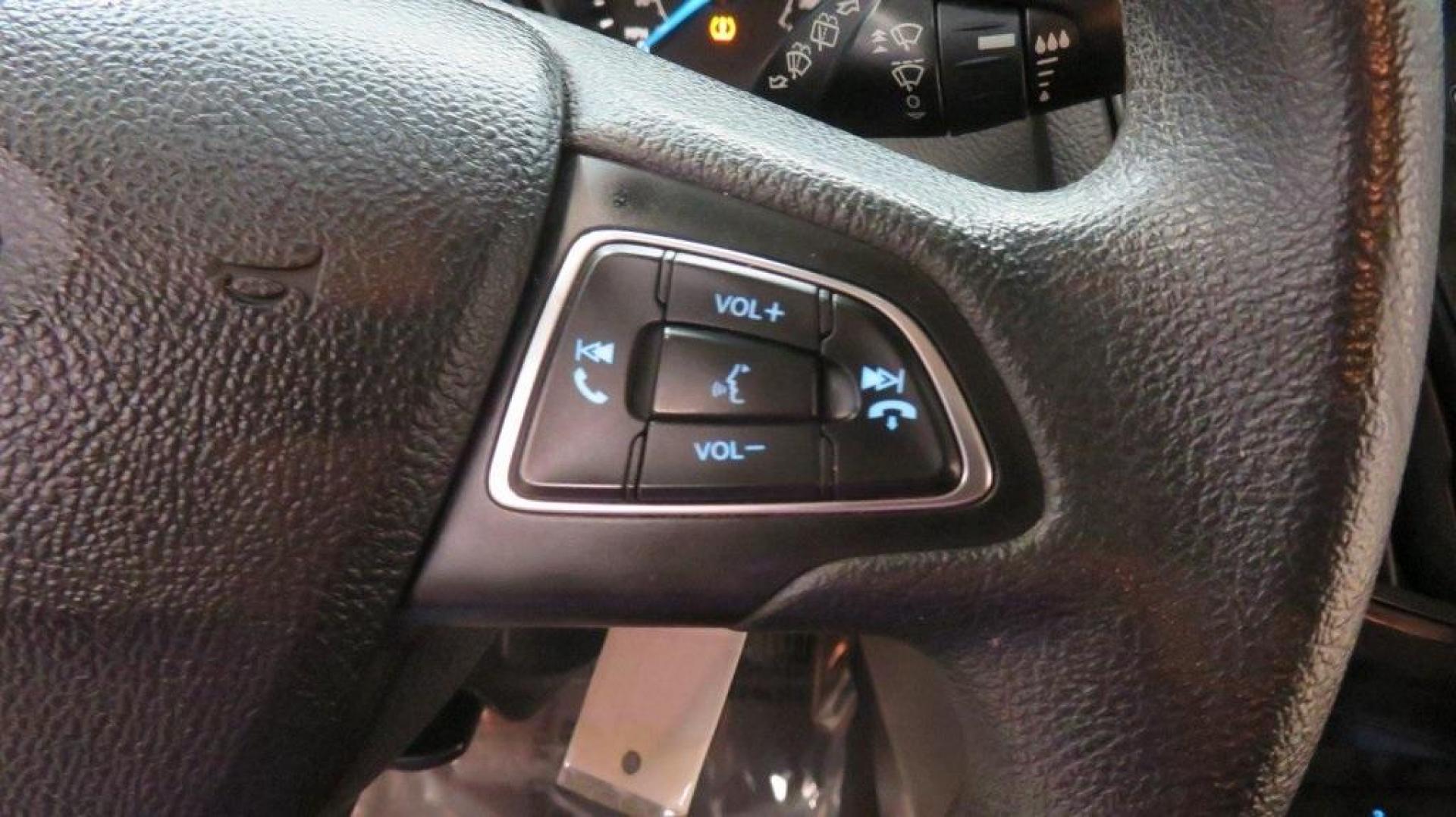 2017 Oxford White /Charcoal Black Ford Focus SE (1FADP3K2XHL) with an 2.0L 4-Cylinder DGI Flex Fuel DOHC engine, Automatic transmission, located at 15300 Midway Rd., Addison, TX, 75001, (972) 702-0011, 32.958321, -96.838074 - Introducing the 2017 Ford Focus SE Hatchback, now available at Midway Auto Group in Addison, Texas. This versatile and stylish compact car is designed to meet the needs of both city driving and weekend adventures.<br><br>Key Features:<br><br>Engine: 2.0L Ti-VCT I-4<br><br>Transmission: 6-speed autom - Photo#20