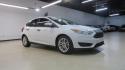 2017 Oxford White /Charcoal Black Ford Focus SE (1FADP3K2XHL) with an 2.0L 4-Cylinder DGI Flex Fuel DOHC engine, Automatic transmission, located at 15300 Midway Rd., Addison, TX, 75001, (972) 702-0011, 32.958321, -96.838074 - Introducing the 2017 Ford Focus SE Hatchback, now available at Midway Auto Group in Addison, Texas. This versatile and stylish compact car is designed to meet the needs of both city driving and weekend adventures.<br><br>Key Features:<br><br>Engine: 2.0L Ti-VCT I-4<br><br>Transmission: 6-speed autom - Photo#6