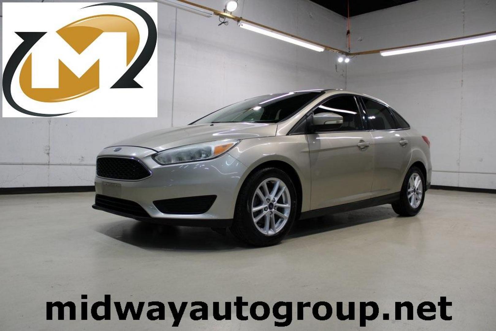 2017 White Gold /Charcoal Black Ford Focus SE (1FADP3F20HL) with an 2.0L 4-Cylinder DGI Flex Fuel Turbocharged DOHC engine, Automatic transmission, located at 15300 Midway Rd., Addison, TX, 75001, (972) 702-0011, 32.958321, -96.838074 - Smart, efficient, and built for everyday life, the 2017 Ford Focus SE offers a dependable and comfortable ride with modern tech and a stylish exterior. Whether you're a commuter or a student, this compact sedan checks all the boxes for affordability, fuel efficiency, and convenience.<br><br>Key Spec - Photo#0