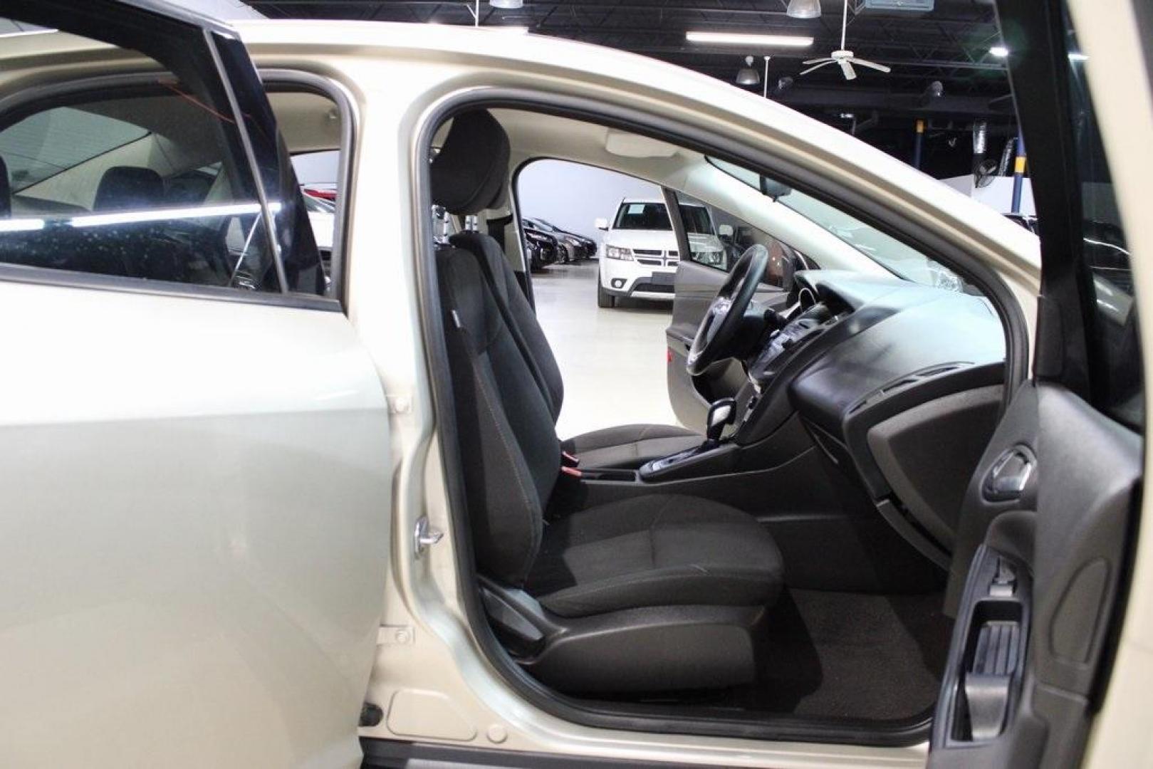 2017 White Gold /Charcoal Black Ford Focus SE (1FADP3F20HL) with an 2.0L 4-Cylinder DGI Flex Fuel Turbocharged DOHC engine, Automatic transmission, located at 15300 Midway Rd., Addison, TX, 75001, (972) 702-0011, 32.958321, -96.838074 - Smart, efficient, and built for everyday life, the 2017 Ford Focus SE offers a dependable and comfortable ride with modern tech and a stylish exterior. Whether you're a commuter or a student, this compact sedan checks all the boxes for affordability, fuel efficiency, and convenience.<br><br>Key Spec - Photo#12