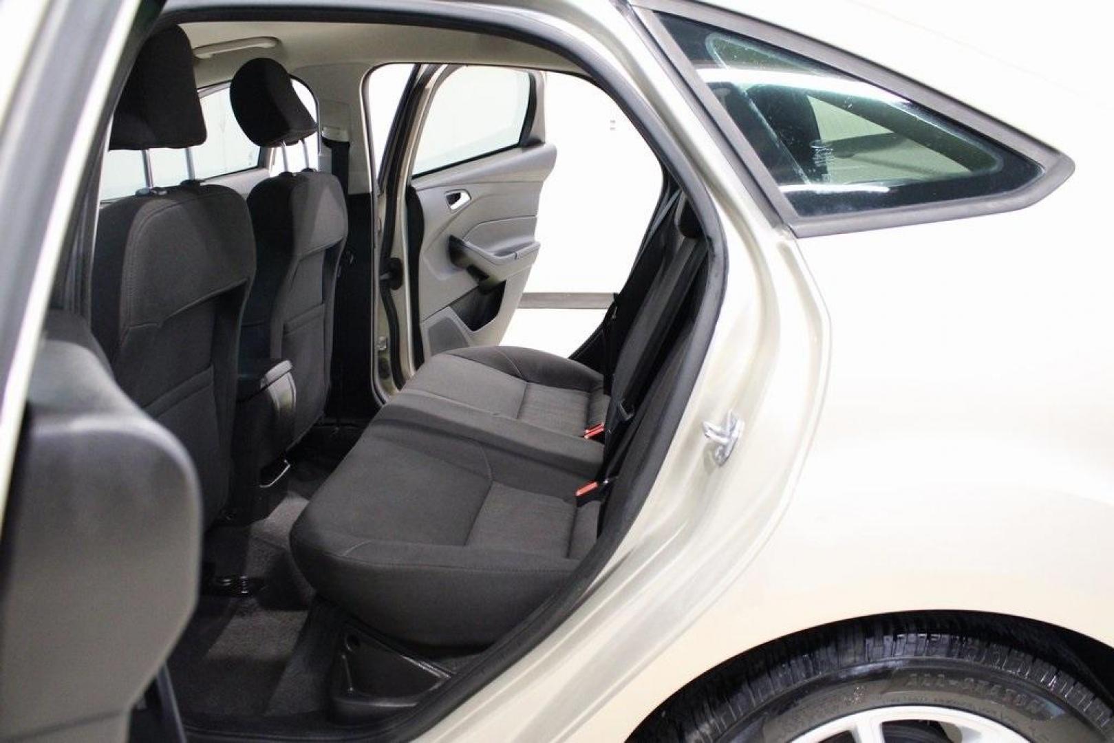 2017 White Gold /Charcoal Black Ford Focus SE (1FADP3F20HL) with an 2.0L 4-Cylinder DGI Flex Fuel Turbocharged DOHC engine, Automatic transmission, located at 15300 Midway Rd., Addison, TX, 75001, (972) 702-0011, 32.958321, -96.838074 - Smart, efficient, and built for everyday life, the 2017 Ford Focus SE offers a dependable and comfortable ride with modern tech and a stylish exterior. Whether you're a commuter or a student, this compact sedan checks all the boxes for affordability, fuel efficiency, and convenience.<br><br>Key Spec - Photo#13