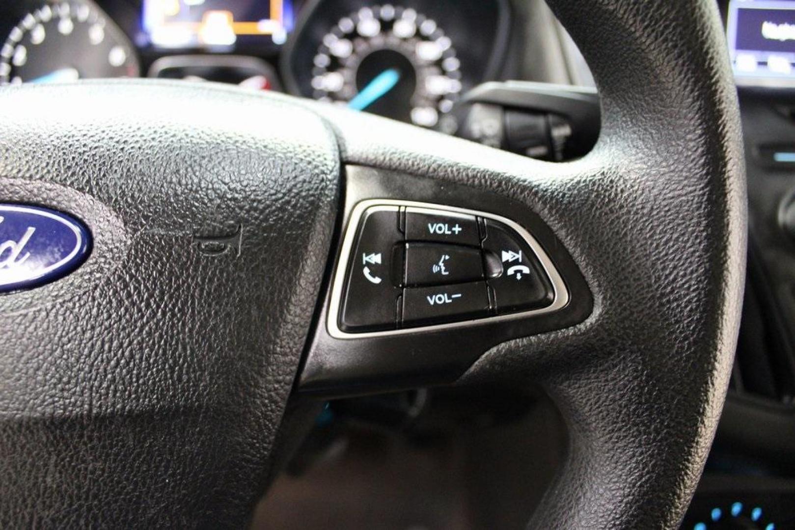 2017 White Gold /Charcoal Black Ford Focus SE (1FADP3F20HL) with an 2.0L 4-Cylinder DGI Flex Fuel Turbocharged DOHC engine, Automatic transmission, located at 15300 Midway Rd., Addison, TX, 75001, (972) 702-0011, 32.958321, -96.838074 - Smart, efficient, and built for everyday life, the 2017 Ford Focus SE offers a dependable and comfortable ride with modern tech and a stylish exterior. Whether you're a commuter or a student, this compact sedan checks all the boxes for affordability, fuel efficiency, and convenience.<br><br>Key Spec - Photo#20