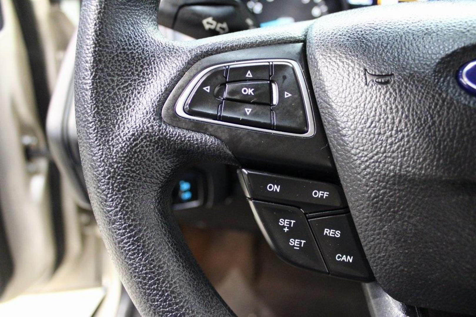 2017 White Gold /Charcoal Black Ford Focus SE (1FADP3F20HL) with an 2.0L 4-Cylinder DGI Flex Fuel Turbocharged DOHC engine, Automatic transmission, located at 15300 Midway Rd., Addison, TX, 75001, (972) 702-0011, 32.958321, -96.838074 - Smart, efficient, and built for everyday life, the 2017 Ford Focus SE offers a dependable and comfortable ride with modern tech and a stylish exterior. Whether you're a commuter or a student, this compact sedan checks all the boxes for affordability, fuel efficiency, and convenience.<br><br>Key Spec - Photo#21
