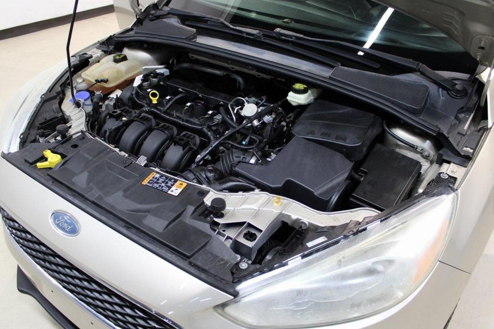 2017 White Gold /Charcoal Black Ford Focus SE (1FADP3F20HL) with an 2.0L 4-Cylinder DGI Flex Fuel Turbocharged DOHC engine, Automatic transmission, located at 15300 Midway Rd., Addison, TX, 75001, (972) 702-0011, 32.958321, -96.838074 - Smart, efficient, and built for everyday life, the 2017 Ford Focus SE offers a dependable and comfortable ride with modern tech and a stylish exterior. Whether you're a commuter or a student, this compact sedan checks all the boxes for affordability, fuel efficiency, and convenience.<br><br>Key Spec - Photo#25