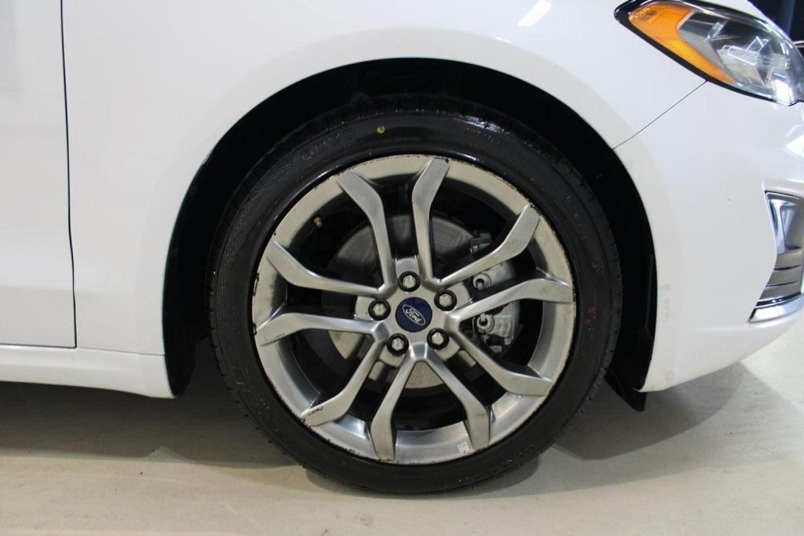 2020 Oxford White /Medium Light Stone Ford Fusion SEL (3FA6P0CD5LR) with an 1.5L EcoBoost engine, Automatic transmission, located at 15300 Midway Rd., Addison, TX, 75001, (972) 702-0011, 32.958321, -96.838074 - Introducing the 2020 Ford Fusion SE, now available at Midway Auto Group in Addison, Texas. This midsize sedan offers a harmonious blend of performance, comfort, and advanced technology, making it an ideal choice for discerning drivers seeking both style and substance.<br><br>Key Specifications:<br>< - Photo#11