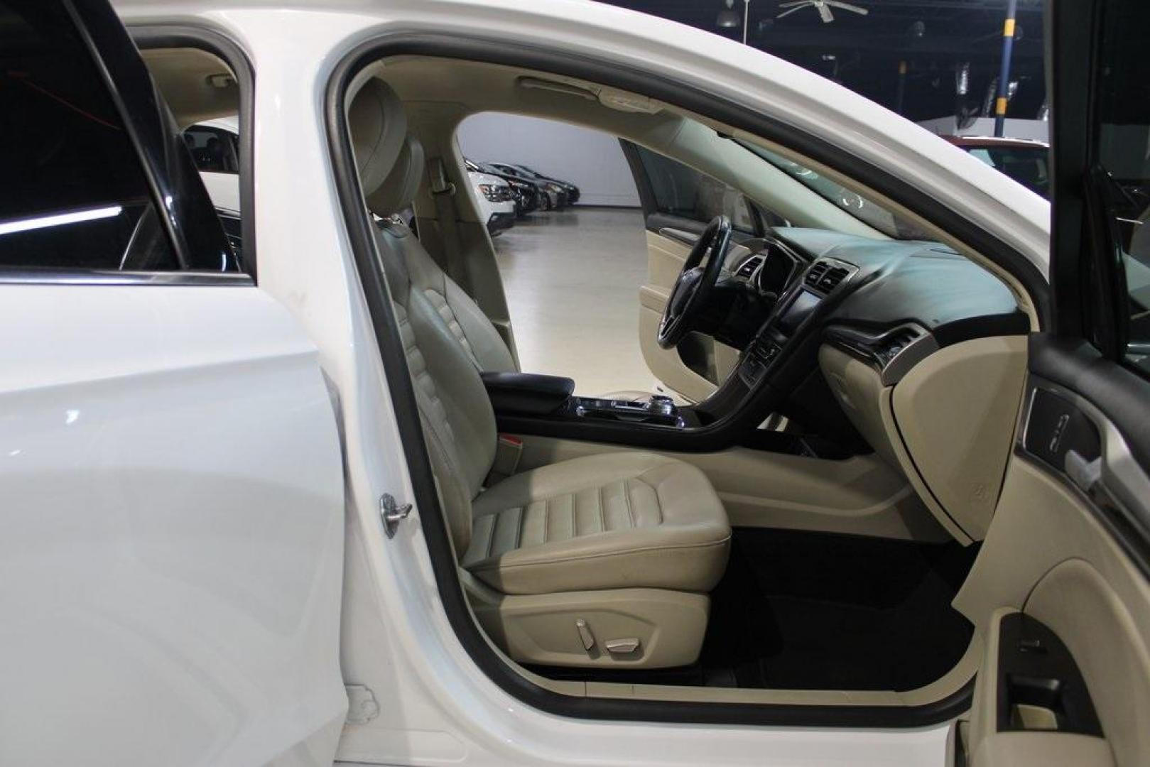 2020 Oxford White /Medium Light Stone Ford Fusion SEL (3FA6P0CD5LR) with an 1.5L EcoBoost engine, Automatic transmission, located at 15300 Midway Rd., Addison, TX, 75001, (972) 702-0011, 32.958321, -96.838074 - Introducing the 2020 Ford Fusion SE, now available at Midway Auto Group in Addison, Texas. This midsize sedan offers a harmonious blend of performance, comfort, and advanced technology, making it an ideal choice for discerning drivers seeking both style and substance.<br><br>Key Specifications:<br>< - Photo#13