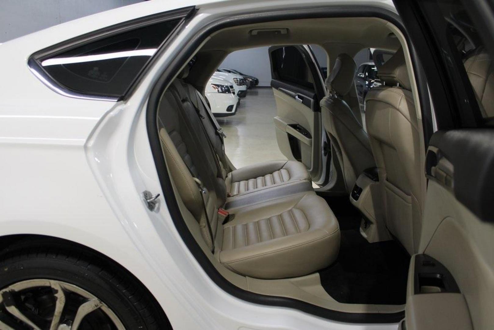 2020 Oxford White /Medium Light Stone Ford Fusion SEL (3FA6P0CD5LR) with an 1.5L EcoBoost engine, Automatic transmission, located at 15300 Midway Rd., Addison, TX, 75001, (972) 702-0011, 32.958321, -96.838074 - Introducing the 2020 Ford Fusion SE, now available at Midway Auto Group in Addison, Texas. This midsize sedan offers a harmonious blend of performance, comfort, and advanced technology, making it an ideal choice for discerning drivers seeking both style and substance.<br><br>Key Specifications:<br>< - Photo#14