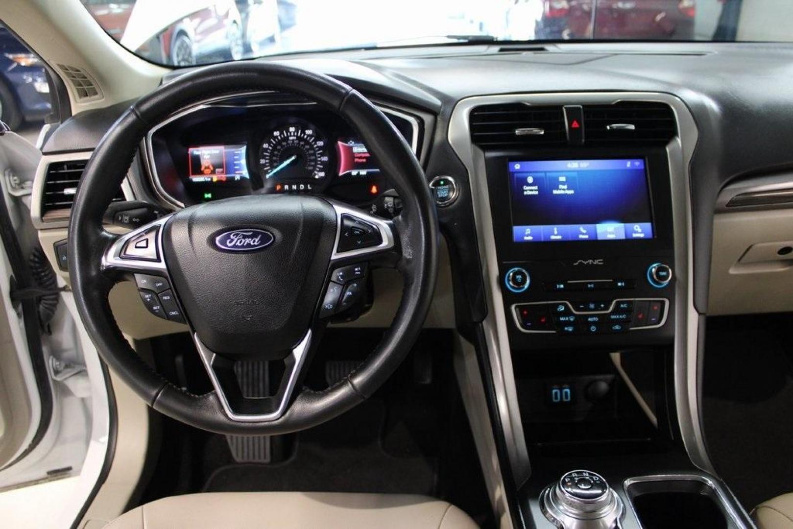 2020 Oxford White /Medium Light Stone Ford Fusion SEL (3FA6P0CD5LR) with an 1.5L EcoBoost engine, Automatic transmission, located at 15300 Midway Rd., Addison, TX, 75001, (972) 702-0011, 32.958321, -96.838074 - Introducing the 2020 Ford Fusion SE, now available at Midway Auto Group in Addison, Texas. This midsize sedan offers a harmonious blend of performance, comfort, and advanced technology, making it an ideal choice for discerning drivers seeking both style and substance.<br><br>Key Specifications:<br>< - Photo#16