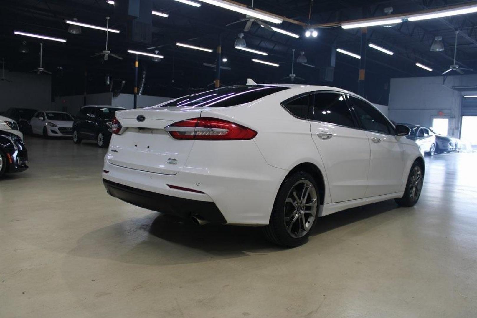 2020 Oxford White /Medium Light Stone Ford Fusion SEL (3FA6P0CD5LR) with an 1.5L EcoBoost engine, Automatic transmission, located at 15300 Midway Rd., Addison, TX, 75001, (972) 702-0011, 32.958321, -96.838074 - Introducing the 2020 Ford Fusion SE, now available at Midway Auto Group in Addison, Texas. This midsize sedan offers a harmonious blend of performance, comfort, and advanced technology, making it an ideal choice for discerning drivers seeking both style and substance.<br><br>Key Specifications:<br>< - Photo#2