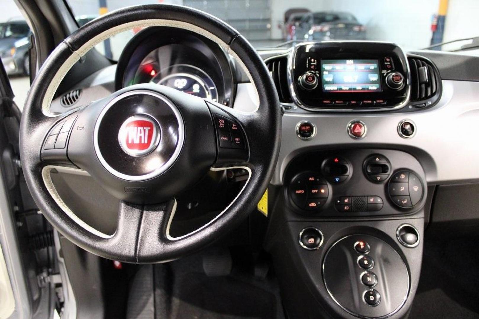 2017 Billet Argento (Silver) /Black Fiat 500e Battery Electric (3C3CFFGE4HT) with an Electric Motor engine, Automatic transmission, located at 15300 Midway Rd., Addison, TX, 75001, (972) 702-0011, 32.958321, -96.838074 - Introducing the 2017 Fiat 500e, now available at Midway Auto Group in Addison, Texas. This all-electric hatchback combines iconic Italian design with eco-friendly performance, making it an excellent choice for those seeking style and sustainability.<br><br>Key Specifications:<br><br>Motor: 111-horse - Photo#16