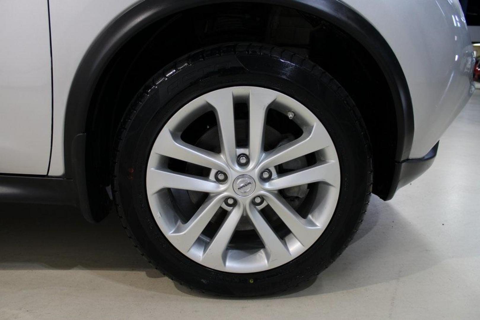 2015 Brilliant Silver /Black Nissan Juke S (JN8AF5MV2FT) with an 1.6L I4 DOHC 16V engine, CVT transmission, located at 15300 Midway Rd., Addison, TX, 75001, (972) 702-0011, 32.958321, -96.838074 - Introducing the 2015 Nissan Juke SL AWD, now available at Midway Auto Group in Addison, Texas. This subcompact crossover combines distinctive styling with turbocharged performance and advanced features, making it an excellent choice for drivers seeking both flair and functionality.<br><br>Key Specif - Photo#11