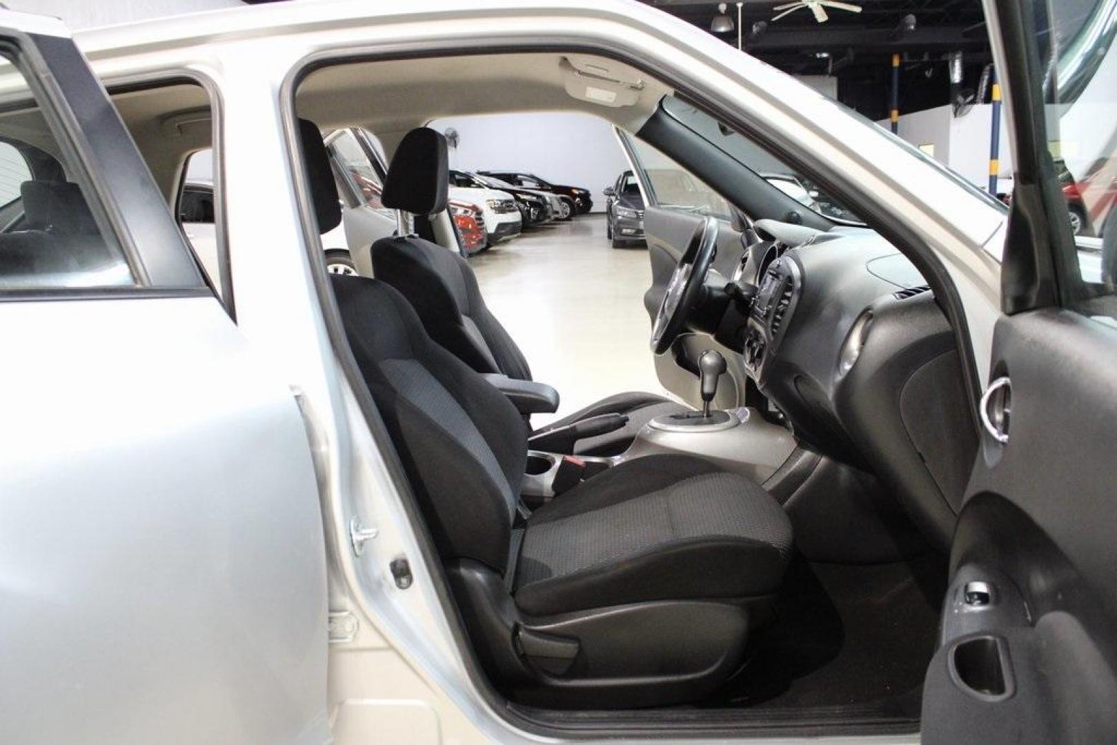2015 Brilliant Silver /Black Nissan Juke S (JN8AF5MV2FT) with an 1.6L I4 DOHC 16V engine, CVT transmission, located at 15300 Midway Rd., Addison, TX, 75001, (972) 702-0011, 32.958321, -96.838074 - Introducing the 2015 Nissan Juke SL AWD, now available at Midway Auto Group in Addison, Texas. This subcompact crossover combines distinctive styling with turbocharged performance and advanced features, making it an excellent choice for drivers seeking both flair and functionality.<br><br>Key Specif - Photo#14