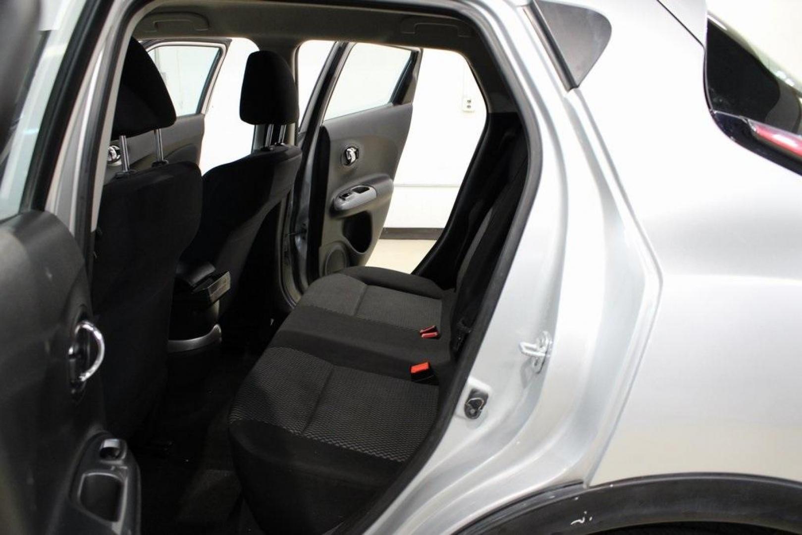 2015 Brilliant Silver /Black Nissan Juke S (JN8AF5MV2FT) with an 1.6L I4 DOHC 16V engine, CVT transmission, located at 15300 Midway Rd., Addison, TX, 75001, (972) 702-0011, 32.958321, -96.838074 - Introducing the 2015 Nissan Juke SL AWD, now available at Midway Auto Group in Addison, Texas. This subcompact crossover combines distinctive styling with turbocharged performance and advanced features, making it an excellent choice for drivers seeking both flair and functionality.<br><br>Key Specif - Photo#16