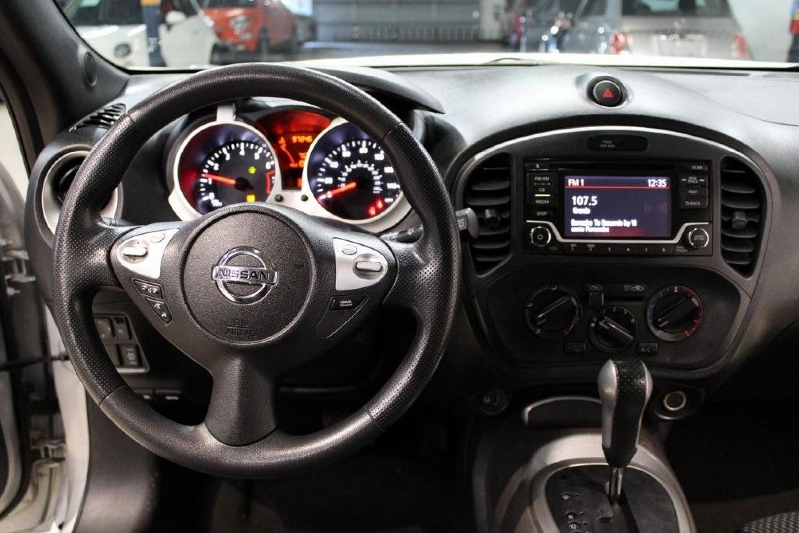 2015 Brilliant Silver /Black Nissan Juke S (JN8AF5MV2FT) with an 1.6L I4 DOHC 16V engine, CVT transmission, located at 15300 Midway Rd., Addison, TX, 75001, (972) 702-0011, 32.958321, -96.838074 - Introducing the 2015 Nissan Juke SL AWD, now available at Midway Auto Group in Addison, Texas. This subcompact crossover combines distinctive styling with turbocharged performance and advanced features, making it an excellent choice for drivers seeking both flair and functionality.<br><br>Key Specif - Photo#17