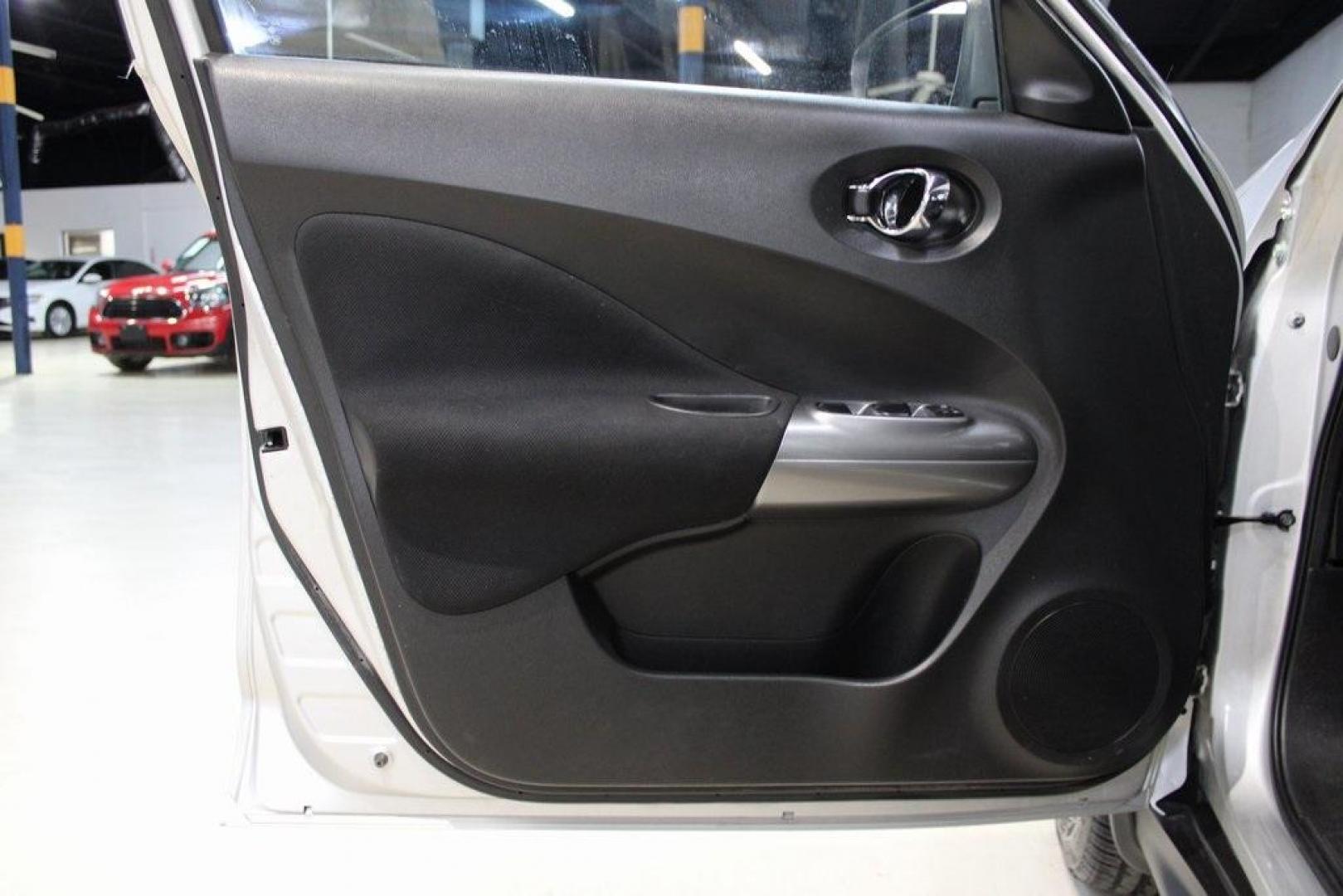 2015 Brilliant Silver /Black Nissan Juke S (JN8AF5MV2FT) with an 1.6L I4 DOHC 16V engine, CVT transmission, located at 15300 Midway Rd., Addison, TX, 75001, (972) 702-0011, 32.958321, -96.838074 - Introducing the 2015 Nissan Juke SL AWD, now available at Midway Auto Group in Addison, Texas. This subcompact crossover combines distinctive styling with turbocharged performance and advanced features, making it an excellent choice for drivers seeking both flair and functionality.<br><br>Key Specif - Photo#25