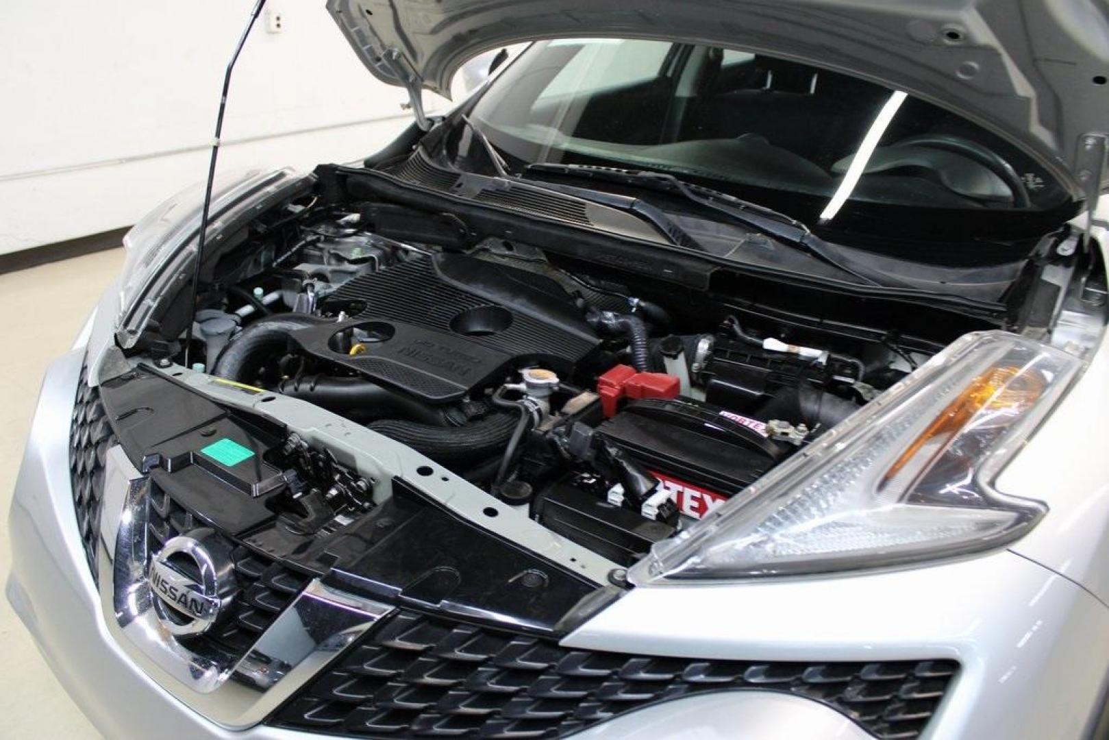 2015 Brilliant Silver /Black Nissan Juke S (JN8AF5MV2FT) with an 1.6L I4 DOHC 16V engine, CVT transmission, located at 15300 Midway Rd., Addison, TX, 75001, (972) 702-0011, 32.958321, -96.838074 - Introducing the 2015 Nissan Juke SL AWD, now available at Midway Auto Group in Addison, Texas. This subcompact crossover combines distinctive styling with turbocharged performance and advanced features, making it an excellent choice for drivers seeking both flair and functionality.<br><br>Key Specif - Photo#28