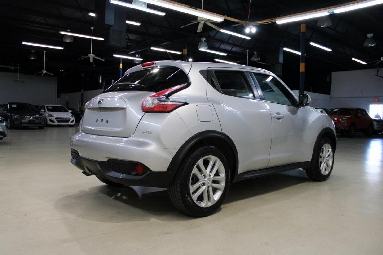 2015 Brilliant Silver /Black Nissan Juke S (JN8AF5MV2FT) with an 1.6L I4 DOHC 16V engine, CVT transmission, located at 15300 Midway Rd., Addison, TX, 75001, (972) 702-0011, 32.958321, -96.838074 - Introducing the 2015 Nissan Juke SL AWD, now available at Midway Auto Group in Addison, Texas. This subcompact crossover combines distinctive styling with turbocharged performance and advanced features, making it an excellent choice for drivers seeking both flair and functionality.<br><br>Key Specif - Photo#2