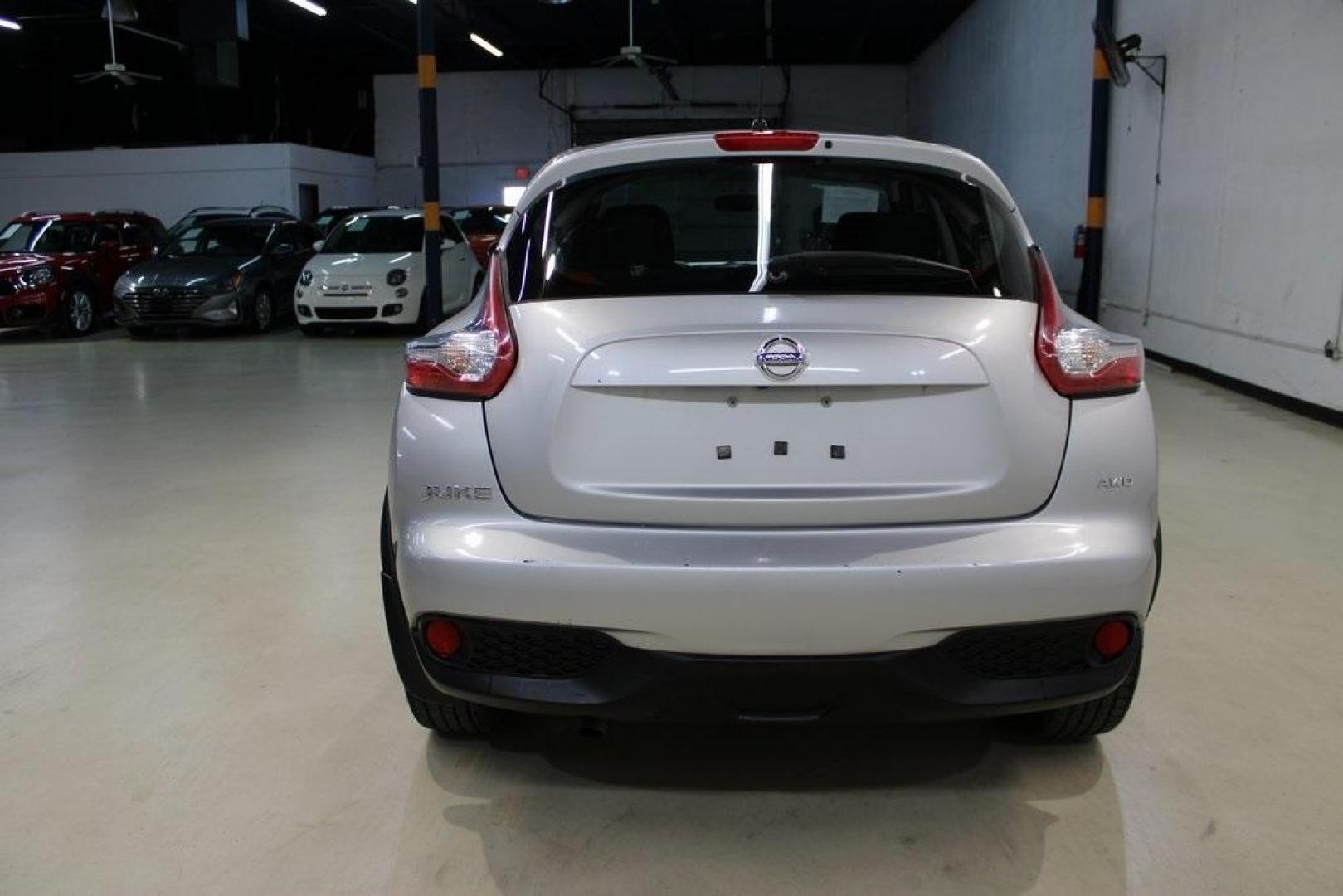 2015 Brilliant Silver /Black Nissan Juke S (JN8AF5MV2FT) with an 1.6L I4 DOHC 16V engine, CVT transmission, located at 15300 Midway Rd., Addison, TX, 75001, (972) 702-0011, 32.958321, -96.838074 - Introducing the 2015 Nissan Juke SL AWD, now available at Midway Auto Group in Addison, Texas. This subcompact crossover combines distinctive styling with turbocharged performance and advanced features, making it an excellent choice for drivers seeking both flair and functionality.<br><br>Key Specif - Photo#7