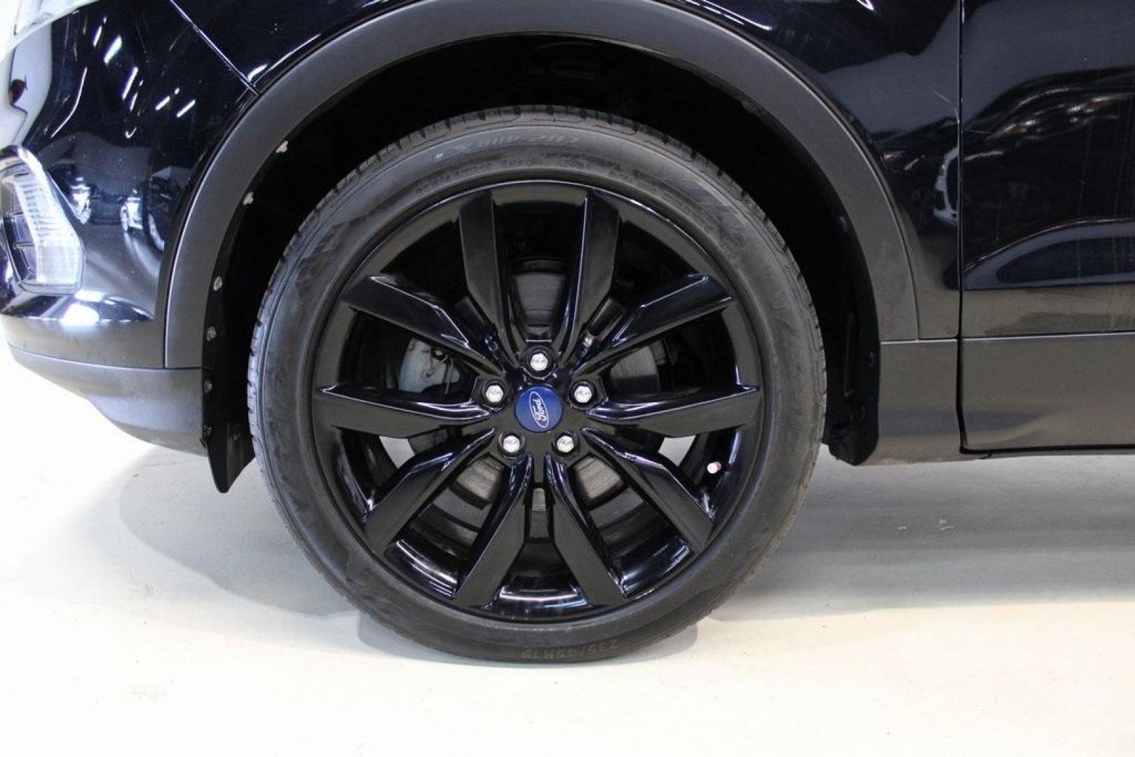 2018 Shadow Black /Charcoal Black Ford Escape SE (1FMCU0GD6JU) with an EcoBoost 2.0L I4 GTDi DOHC Turbocharged VCT engine, Automatic transmission, located at 15300 Midway Rd., Addison, TX, 75001, (972) 702-0011, 32.958321, -96.838074 - 2018 Ford Escape SE<br>Now Available at Midway Auto Group Addison, Texas<br><br>Well-rounded, efficient, and built for everyday versatility, the 2018 Ford Escape SE is the compact SUV that adapts to your lifestyle. With its turbocharged power, smooth ride, and smart interior layout, the Escape is i - Photo#9
