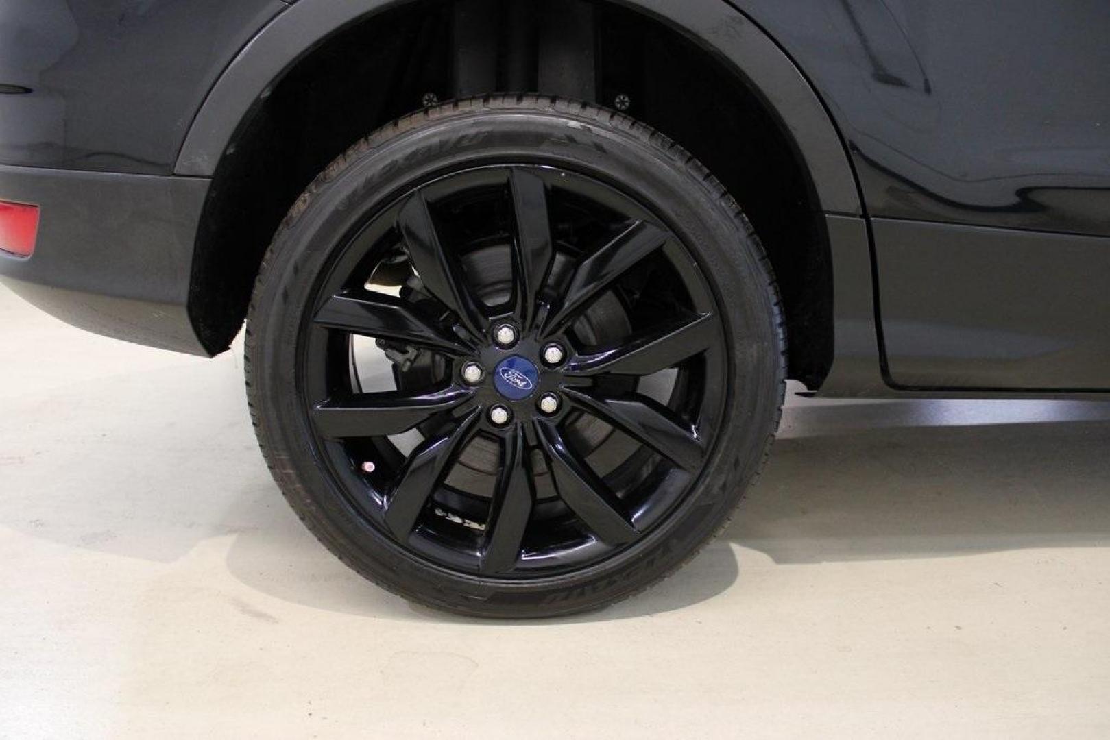 2018 Shadow Black /Charcoal Black Ford Escape SE (1FMCU0GD6JU) with an EcoBoost 2.0L I4 GTDi DOHC Turbocharged VCT engine, Automatic transmission, located at 15300 Midway Rd., Addison, TX, 75001, (972) 702-0011, 32.958321, -96.838074 - 2018 Ford Escape SE<br>Now Available at Midway Auto Group Addison, Texas<br><br>Well-rounded, efficient, and built for everyday versatility, the 2018 Ford Escape SE is the compact SUV that adapts to your lifestyle. With its turbocharged power, smooth ride, and smart interior layout, the Escape is i - Photo#11