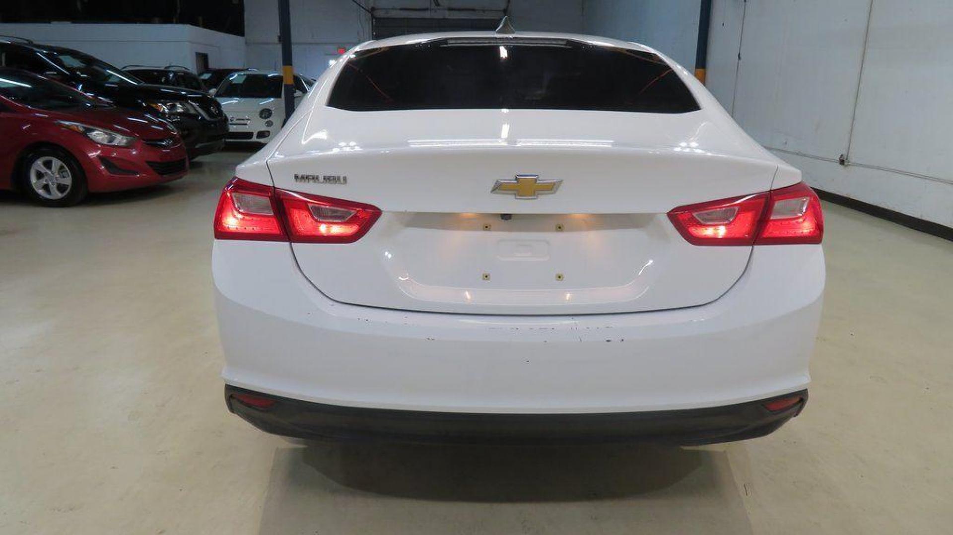 2019 Summit White /Jet Black Chevrolet Malibu LS (1G1ZB5ST0KF) with an 1.5L DOHC engine, CVT transmission, located at 15300 Midway Rd., Addison, TX, 75001, (972) 702-0011, 32.958321, -96.838074 - 2019 Chevrolet Malibu LS<br>Available Now at Midway Auto Group Addison, Texas<br><br>Elevate your daily drive with this sleek and efficient 2019 Chevrolet Malibu LS. Combining stylish design, impressive fuel economy, and modern technology, the Malibu LS is perfect for those who appreciate comfort a - Photo#7