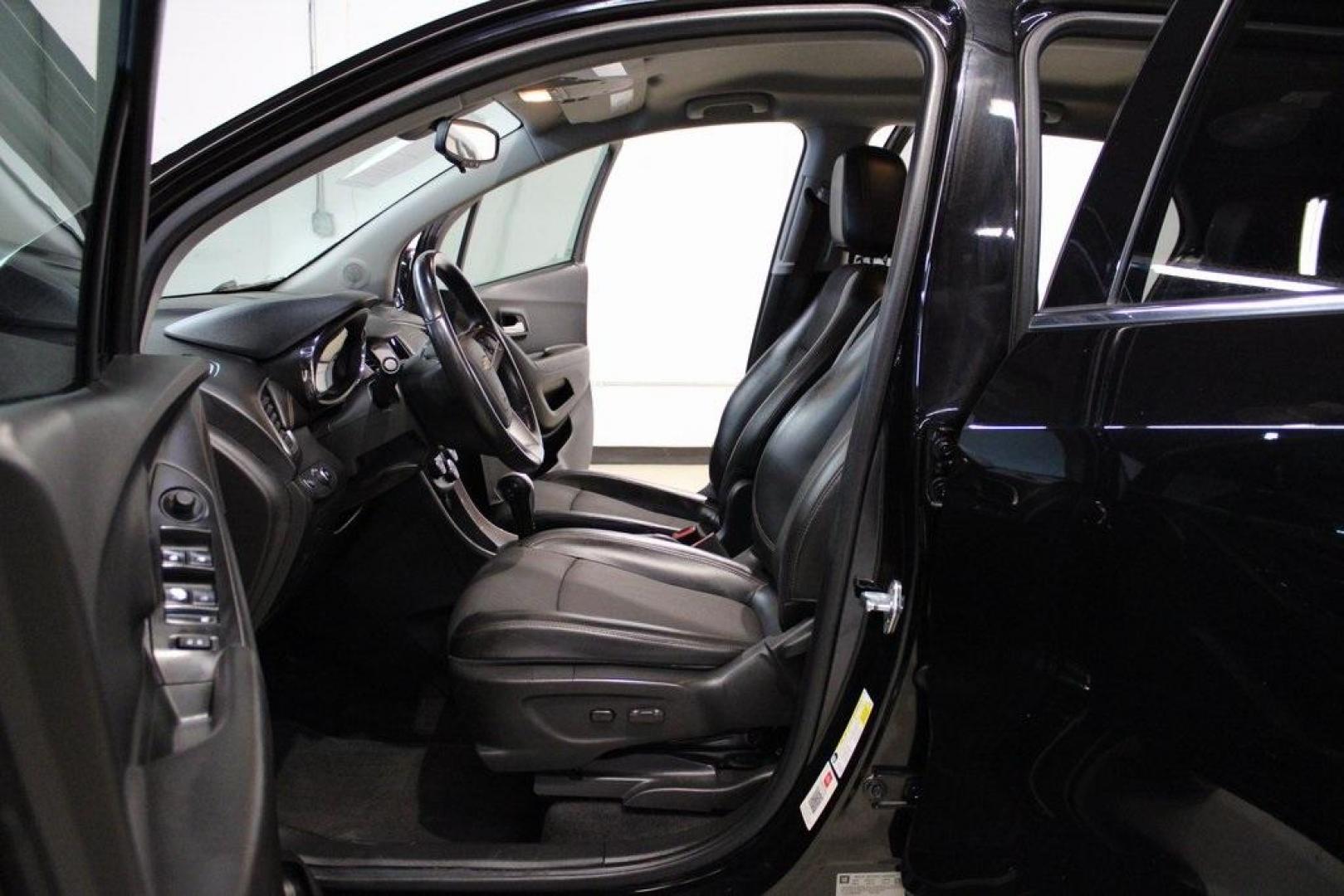 2020 Gb0 /Jet Black Chevrolet Trax LT (KL7CJLSB2LB) with an ECOTEC 1.4L I4 SMPI DOHC Turbocharged VVT engine, Automatic transmission, located at 15300 Midway Rd., Addison, TX, 75001, (972) 702-0011, 32.958321, -96.838074 - 2020 Chevrolet Trax LT<br>Now Available at Midway Auto Group Addison, Texas<br><br>The 2020 Chevrolet Trax LT combines compact versatility with exceptional efficiency, making it the perfect SUV for navigating Addisons busy streets or exploring Texas highways. Comfortable, connected, and safe, this - Photo#12