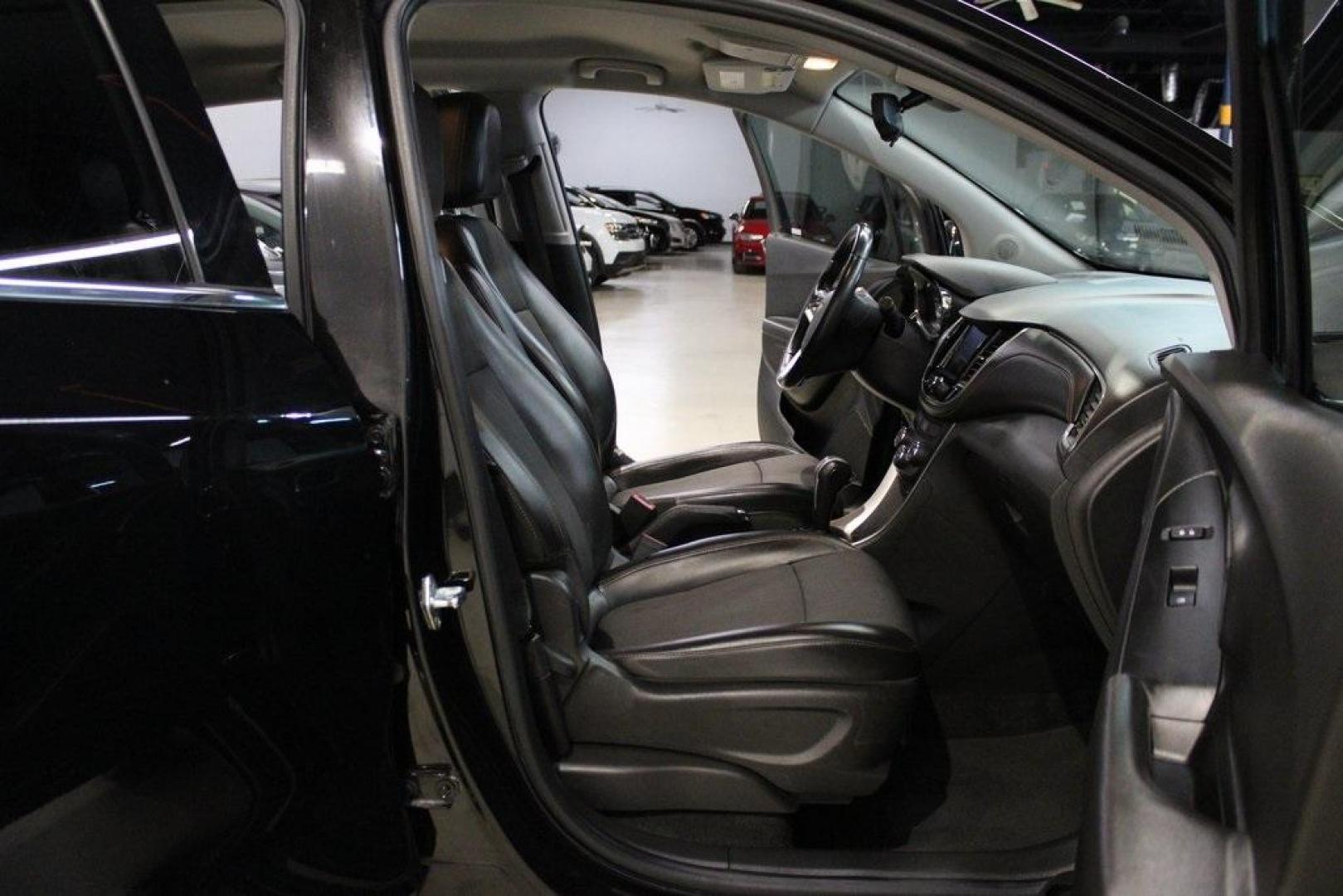 2020 Gb0 /Jet Black Chevrolet Trax LT (KL7CJLSB2LB) with an ECOTEC 1.4L I4 SMPI DOHC Turbocharged VVT engine, Automatic transmission, located at 15300 Midway Rd., Addison, TX, 75001, (972) 702-0011, 32.958321, -96.838074 - 2020 Chevrolet Trax LT<br>Now Available at Midway Auto Group Addison, Texas<br><br>The 2020 Chevrolet Trax LT combines compact versatility with exceptional efficiency, making it the perfect SUV for navigating Addisons busy streets or exploring Texas highways. Comfortable, connected, and safe, this - Photo#13