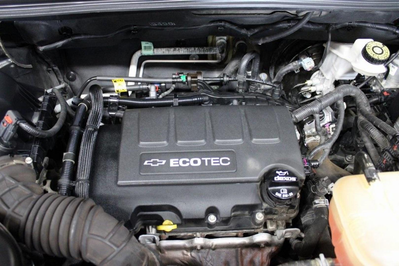 2020 Gb0 /Jet Black Chevrolet Trax LT (KL7CJLSB2LB) with an ECOTEC 1.4L I4 SMPI DOHC Turbocharged VVT engine, Automatic transmission, located at 15300 Midway Rd., Addison, TX, 75001, (972) 702-0011, 32.958321, -96.838074 - 2020 Chevrolet Trax LT<br>Now Available at Midway Auto Group Addison, Texas<br><br>The 2020 Chevrolet Trax LT combines compact versatility with exceptional efficiency, making it the perfect SUV for navigating Addisons busy streets or exploring Texas highways. Comfortable, connected, and safe, this - Photo#26