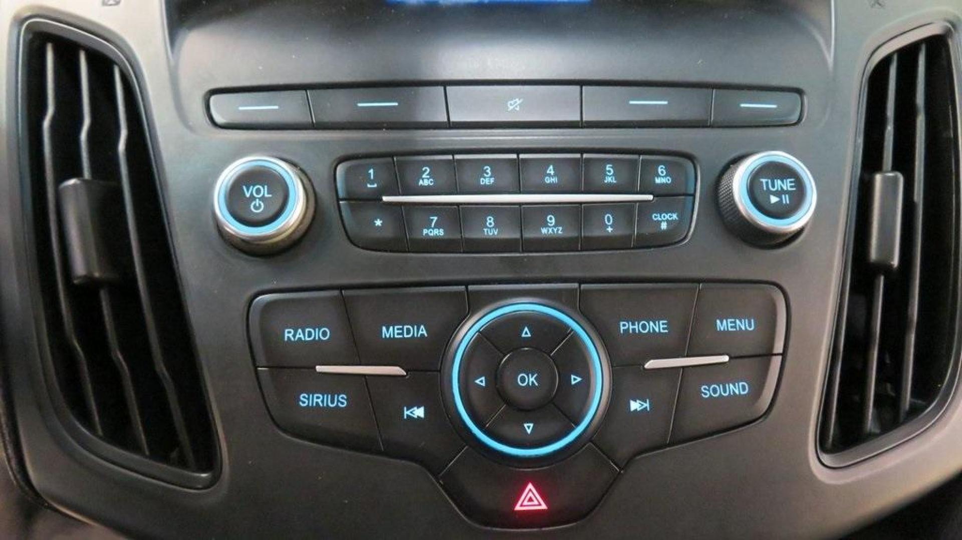 2018 Shadow Black /Charcoal Black Ford Focus SE (1FADP3K28JL) with an 2.0L I4 DGI Ti-VCT engine, Automatic transmission, located at 15300 Midway Rd., Addison, TX, 75001, (972) 702-0011, 32.958321, -96.838074 - 2018 Ford Focus SE Hatchback<br>Now Available at Midway Auto Group Addison, Texas<br><br>The 2018 Ford Focus SE Hatchback combines practicality, efficiency, and style, making it the ideal choice for daily commutes and weekend getaways alike. With its sporty handling, comfortable interior, and advan - Photo#20