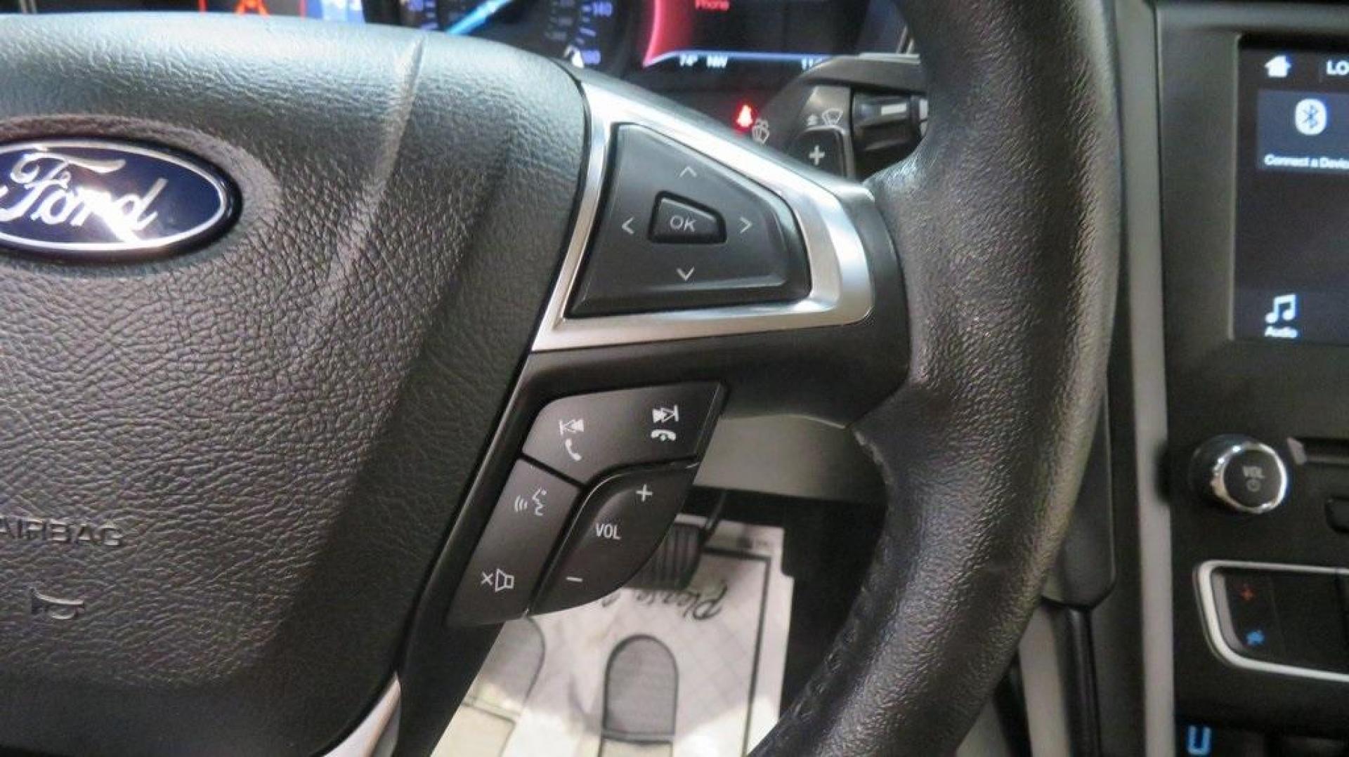 2018 Lightning Blue /Ebony Ford Fusion SE (3FA6P0HDXJR) with an 1.5L EcoBoost engine, Automatic transmission, located at 15300 Midway Rd., Addison, TX, 75001, (972) 702-0011, 32.958321, -96.838074 - 2018 Ford Fusion SE<br>Available now at Midway Auto Group Addison, Texas<br><br>Discover sophisticated styling and impressive performance in the 2018 Ford Fusion SE at Midway Auto Group. Designed for comfort and convenience, this sedan is perfect for daily commutes, weekend adventures, and everythi - Photo#23