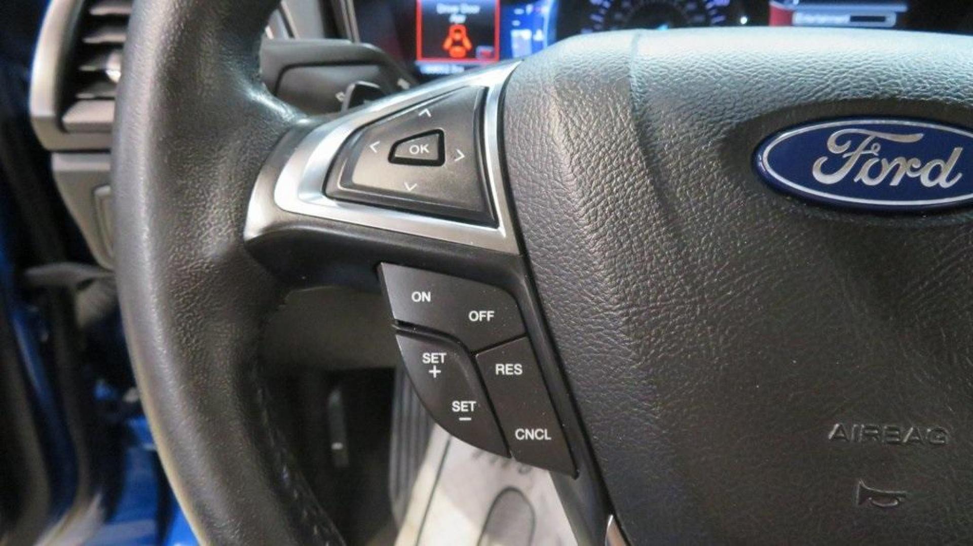 2018 Lightning Blue /Ebony Ford Fusion SE (3FA6P0HDXJR) with an 1.5L EcoBoost engine, Automatic transmission, located at 15300 Midway Rd., Addison, TX, 75001, (972) 702-0011, 32.958321, -96.838074 - 2018 Ford Fusion SE<br>Available now at Midway Auto Group Addison, Texas<br><br>Discover sophisticated styling and impressive performance in the 2018 Ford Fusion SE at Midway Auto Group. Designed for comfort and convenience, this sedan is perfect for daily commutes, weekend adventures, and everythi - Photo#24