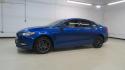 2018 Lightning Blue /Ebony Ford Fusion SE (3FA6P0HDXJR) with an 1.5L EcoBoost engine, Automatic transmission, located at 15300 Midway Rd., Addison, TX, 75001, (972) 702-0011, 32.958321, -96.838074 - 2018 Ford Fusion SE<br>Available now at Midway Auto Group Addison, Texas<br><br>Discover sophisticated styling and impressive performance in the 2018 Ford Fusion SE at Midway Auto Group. Designed for comfort and convenience, this sedan is perfect for daily commutes, weekend adventures, and everythi - Photo#4
