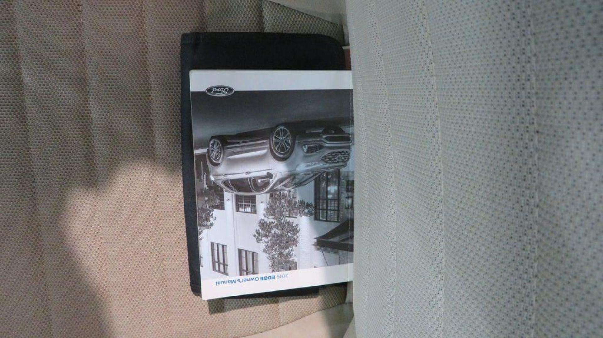 2019 Oxford White /Dune Ford Edge SE (2FMPK3G95KB) with an EcoBoost 2.0L I4 GTDi DOHC Turbocharged VCT engine, Automatic transmission, located at 15300 Midway Rd., Addison, TX, 75001, (972) 702-0011, 32.958321, -96.838074 - 2019 Ford Edge SE<br>Available Now at Midway Auto Group Addison, Texas<br><br>Step into comfort and confidence with this stylish 2019 Ford Edge SE. Designed to provide a perfect blend of performance, technology, and versatility, the Edge makes every drive enjoyablewhether navigating the streets of - Photo#12